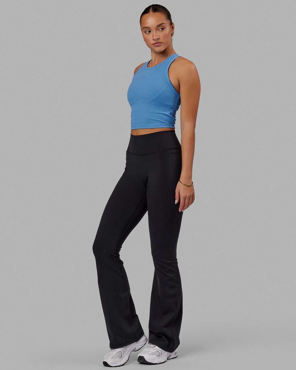 Woman wearing Everyday Flare Tight With Pockets - Black