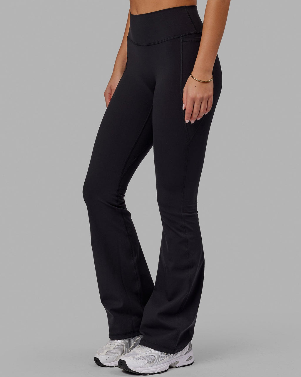 Woman wearing Everyday Flare Tight With Pockets - Black