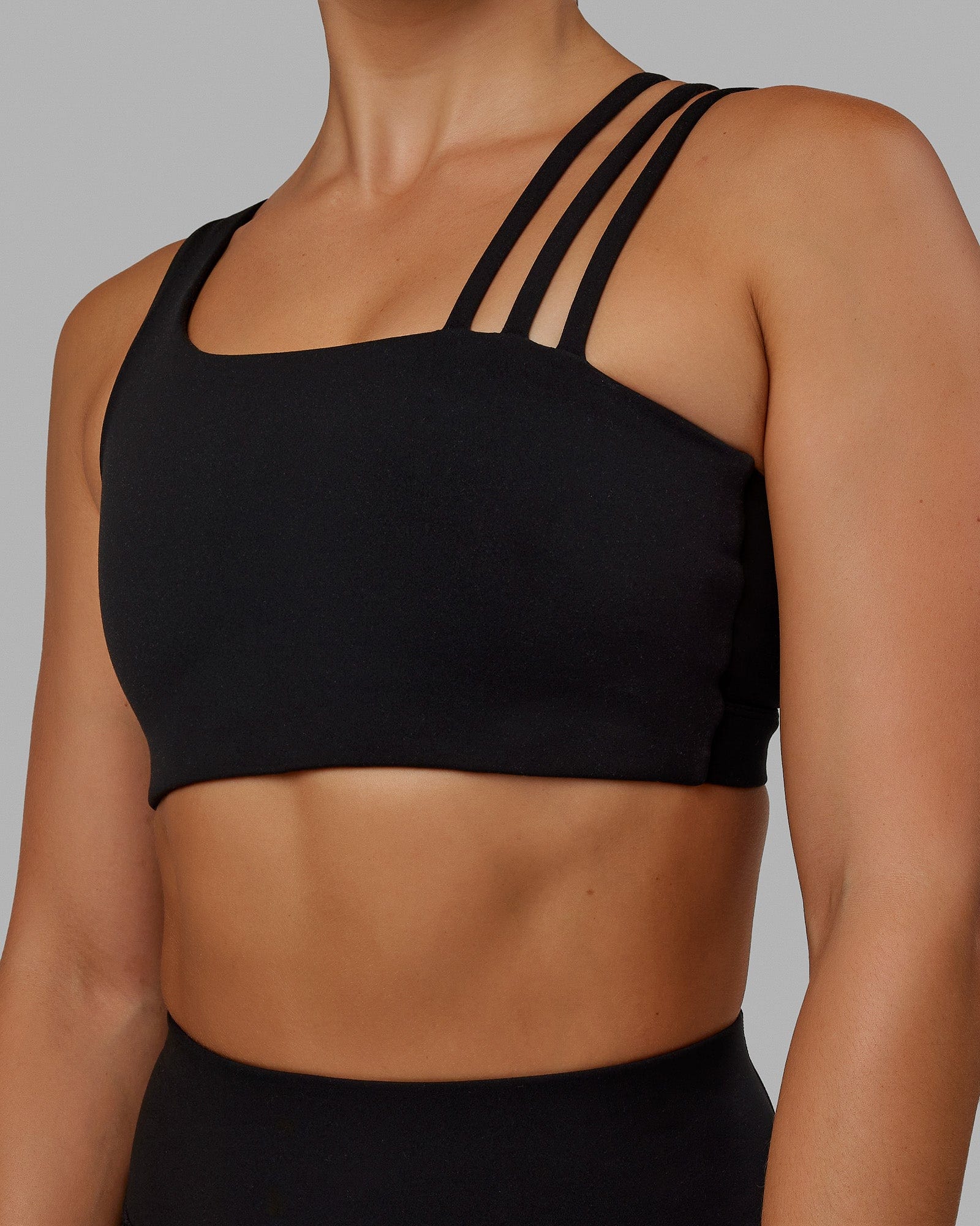 Woman wearing Galvanise Sports Bra - Black