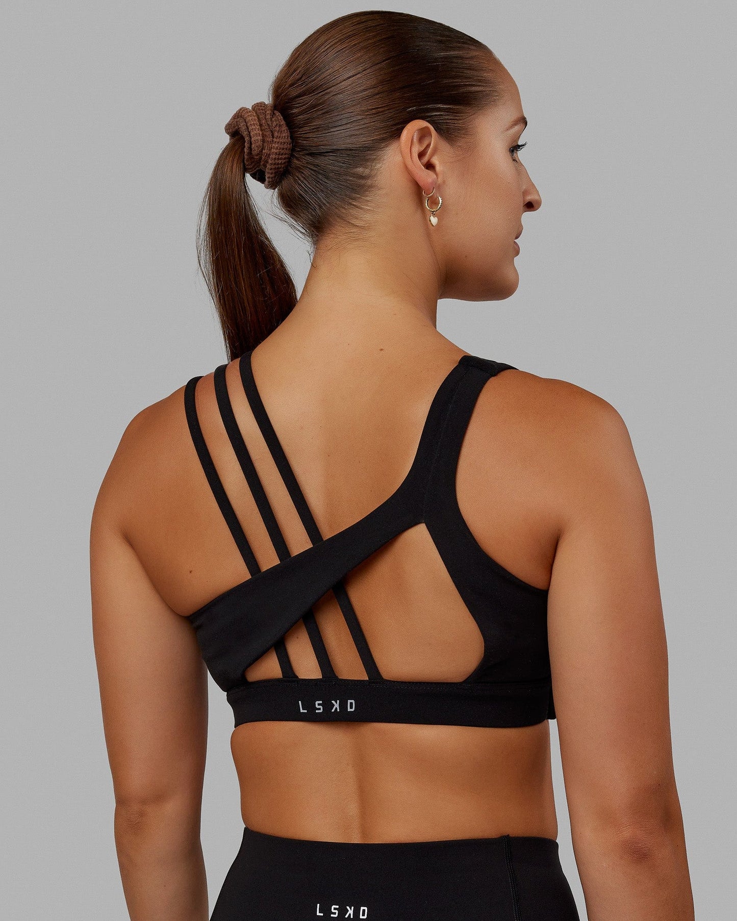 Woman wearing Galvanise Sports Bra - Black