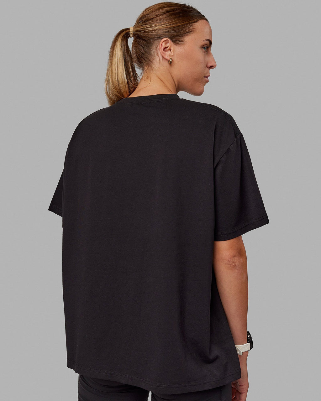 Woman wearing Go-To FLXCotton Oversized Tee - Black-White