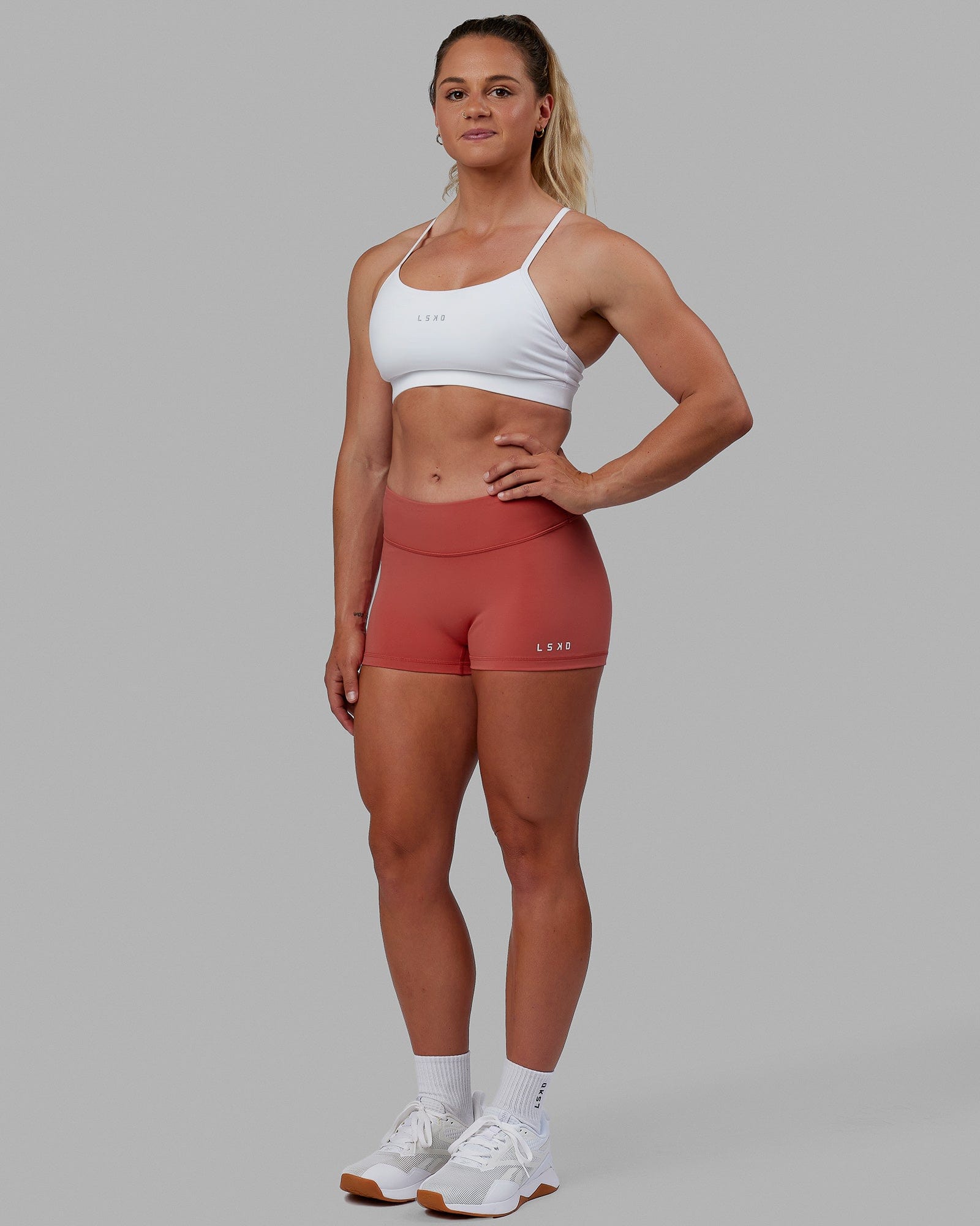 Woman wearing Lift Sports Bra - White