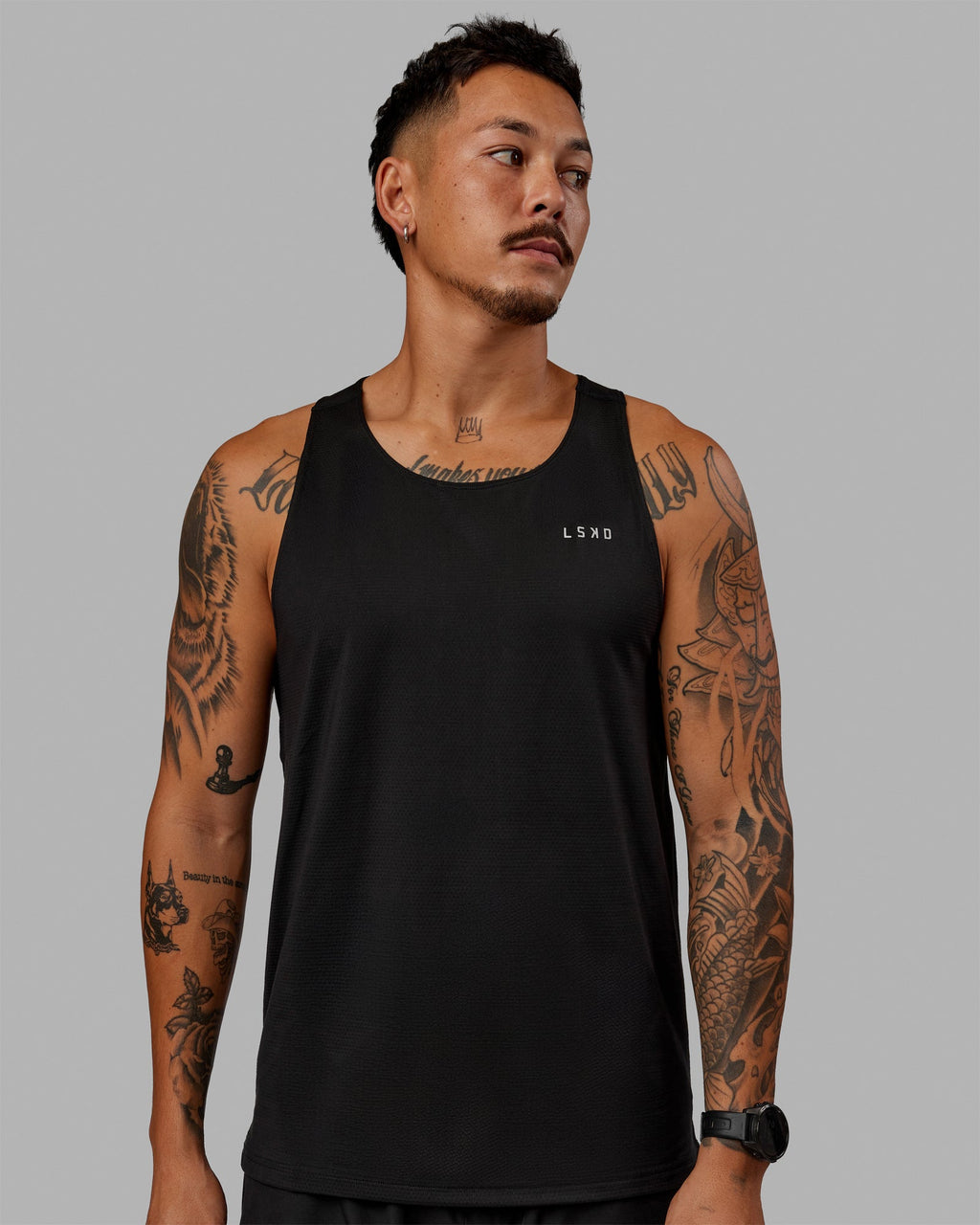Man wearing Perform VapourFLX Tank - Black-Reflective