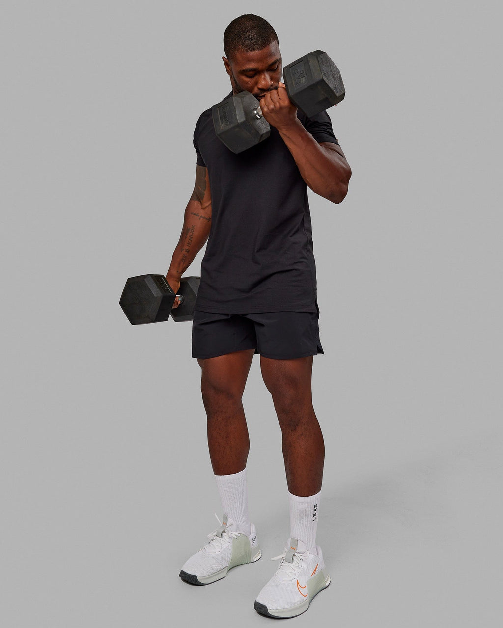 Man wearing Perform VapourFLX Tee - Black-Reflective