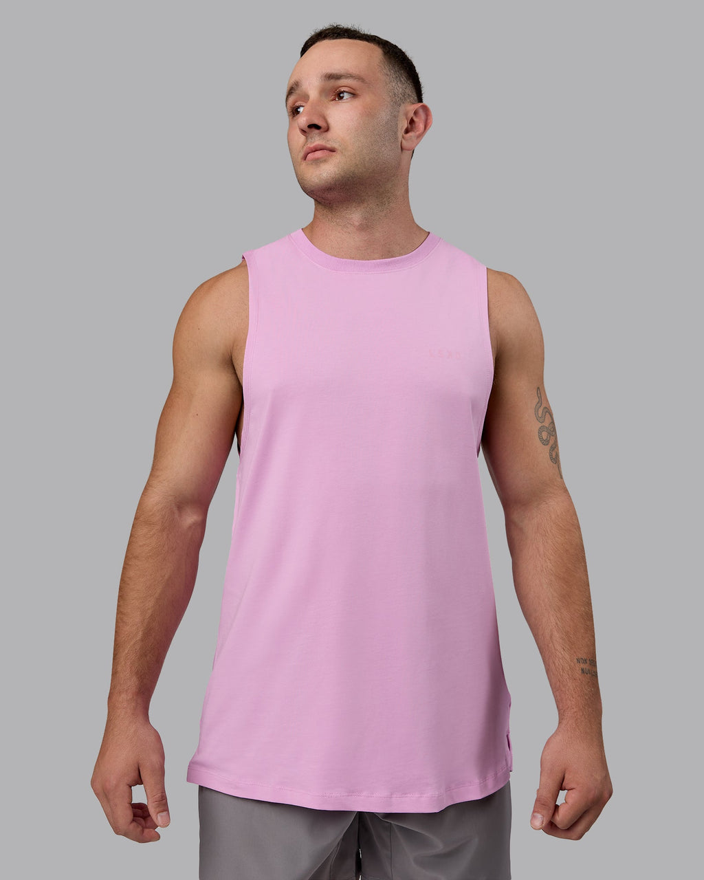 Man wearing Deluxe PimaFLX Tank - Pastel Orchid