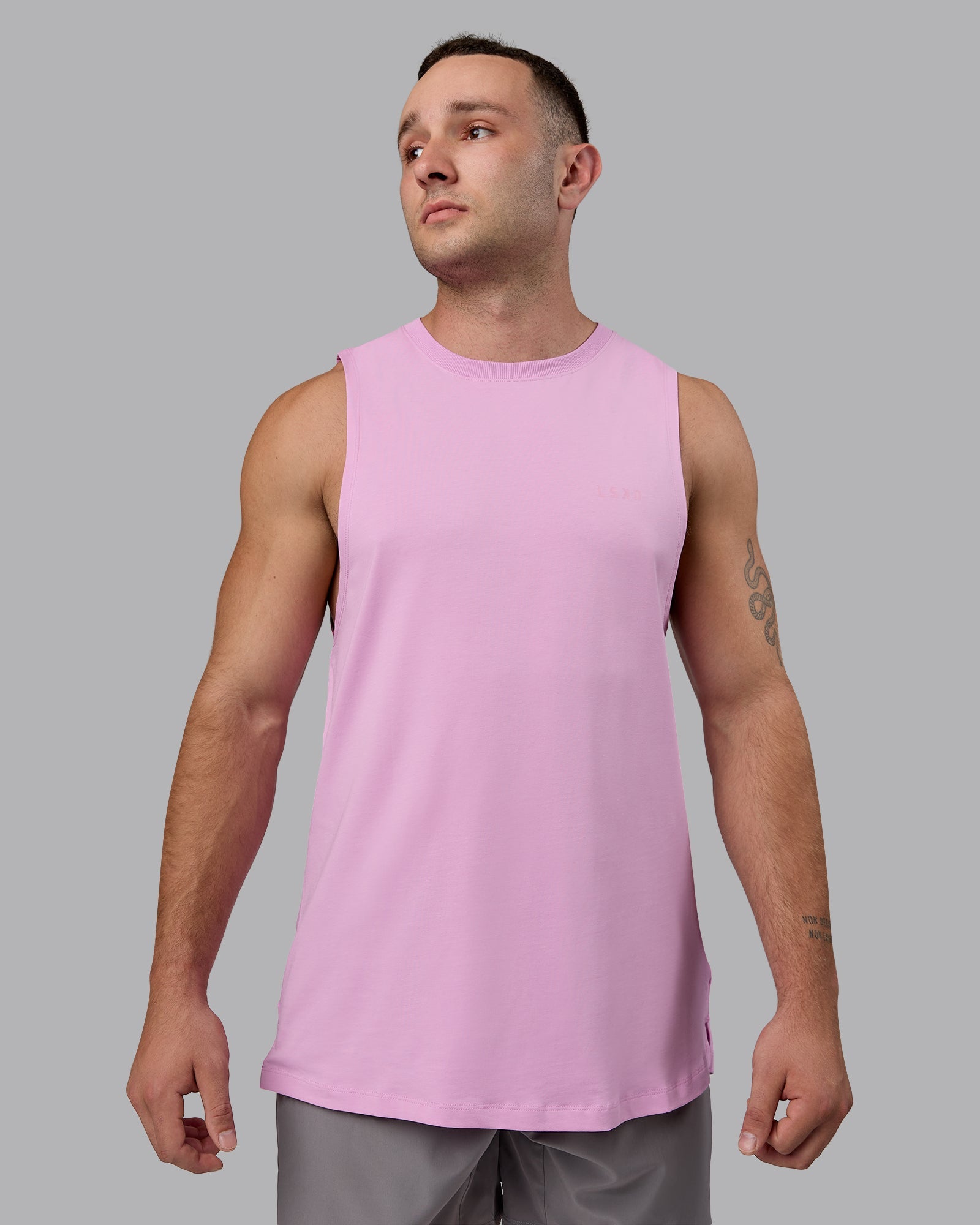 Man wearing Deluxe PimaFLX Tank - Pastel Orchid