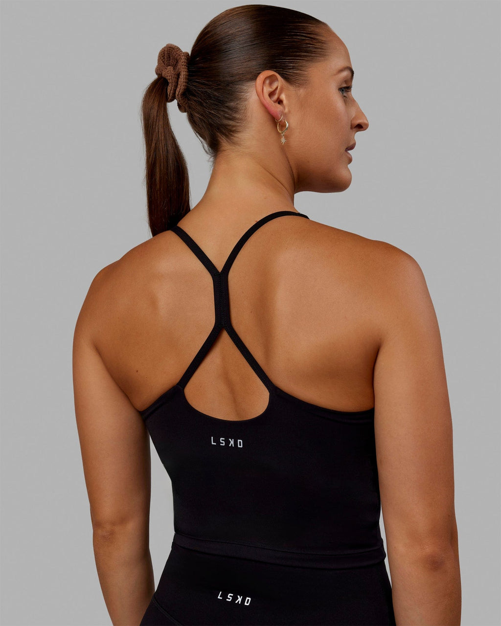 Woman wearing Movement Active Tank - Black
