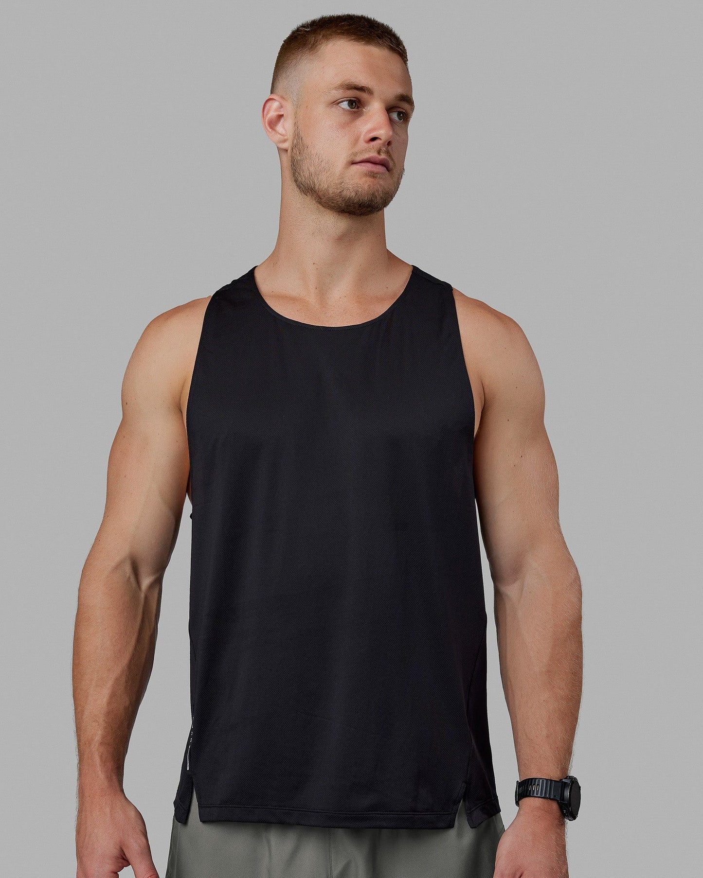 Man wearing Pace Running Tank - Black