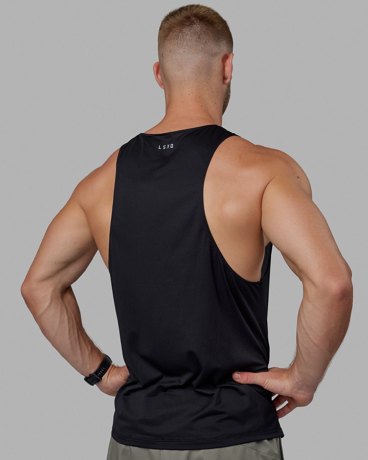 Man wearing Pace Running Tank - Black