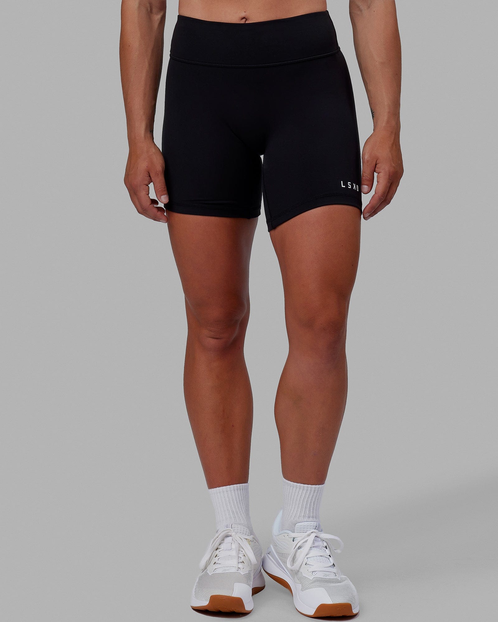 Woman wearing RXD Mid Short Tight - Black