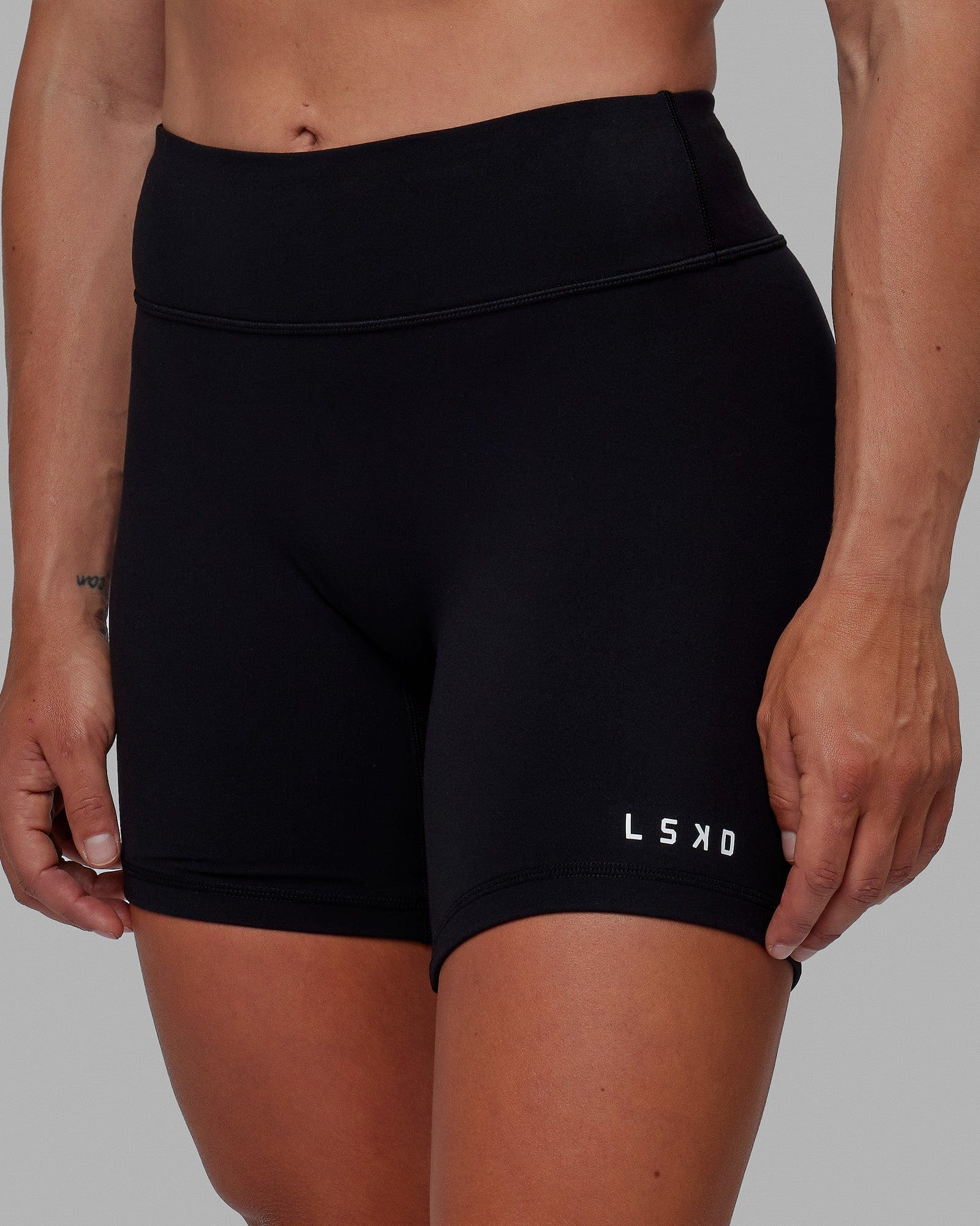 Woman wearing RXD Mid Short Tight - Black