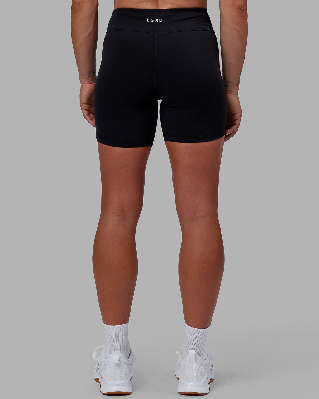 Woman wearing RXD Mid Short Tight - Black