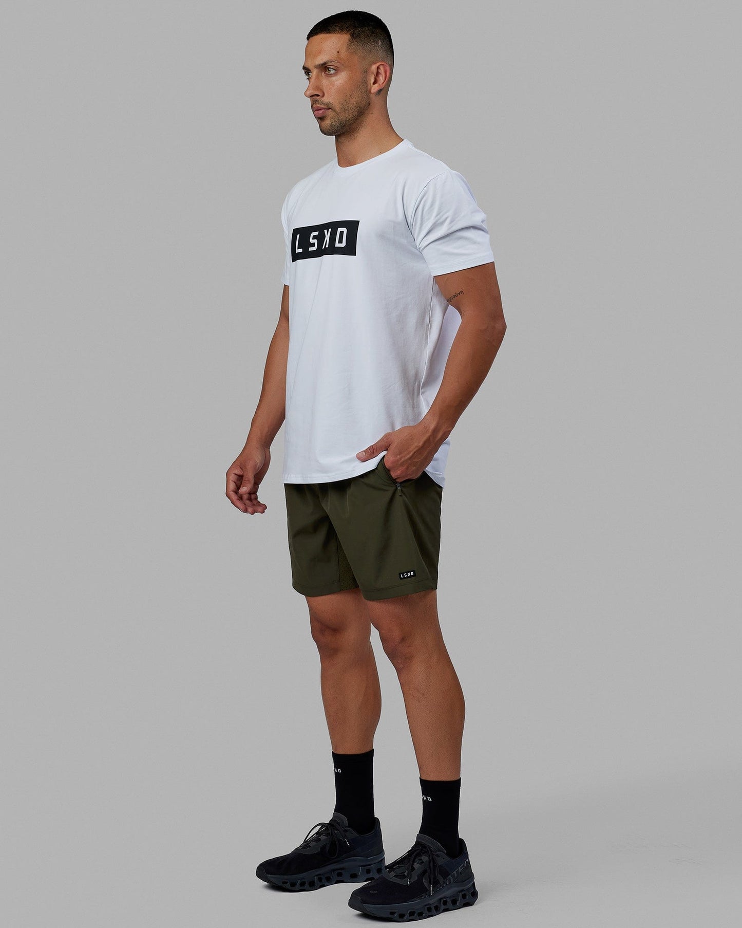 Man wearing Rep 7'' Performance Short - Forest Night
