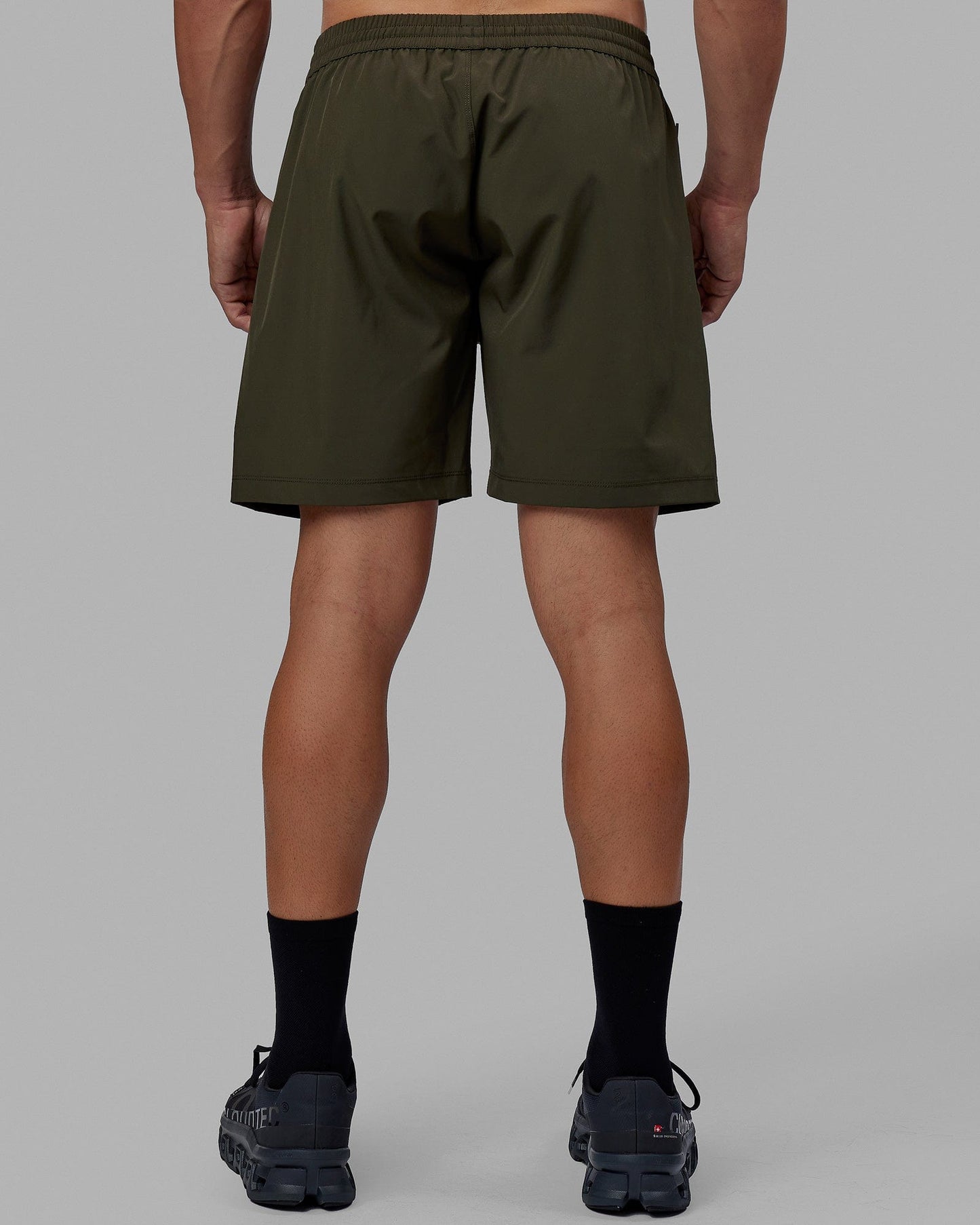Man wearing Rep 7'' Performance Short - Forest Night