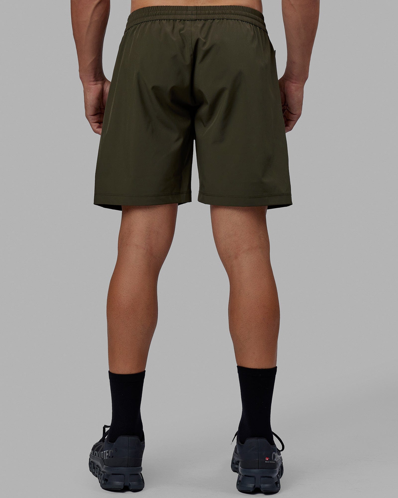 Man wearing Rep 7'' Performance Short - Forest Night