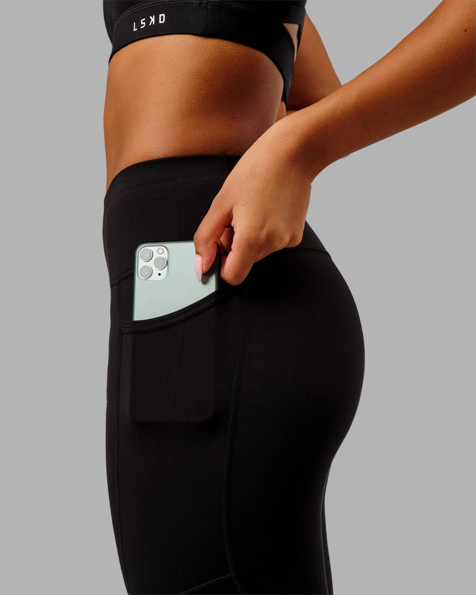 Woman wearing Rep 7/8 Length Tight - Black-Black