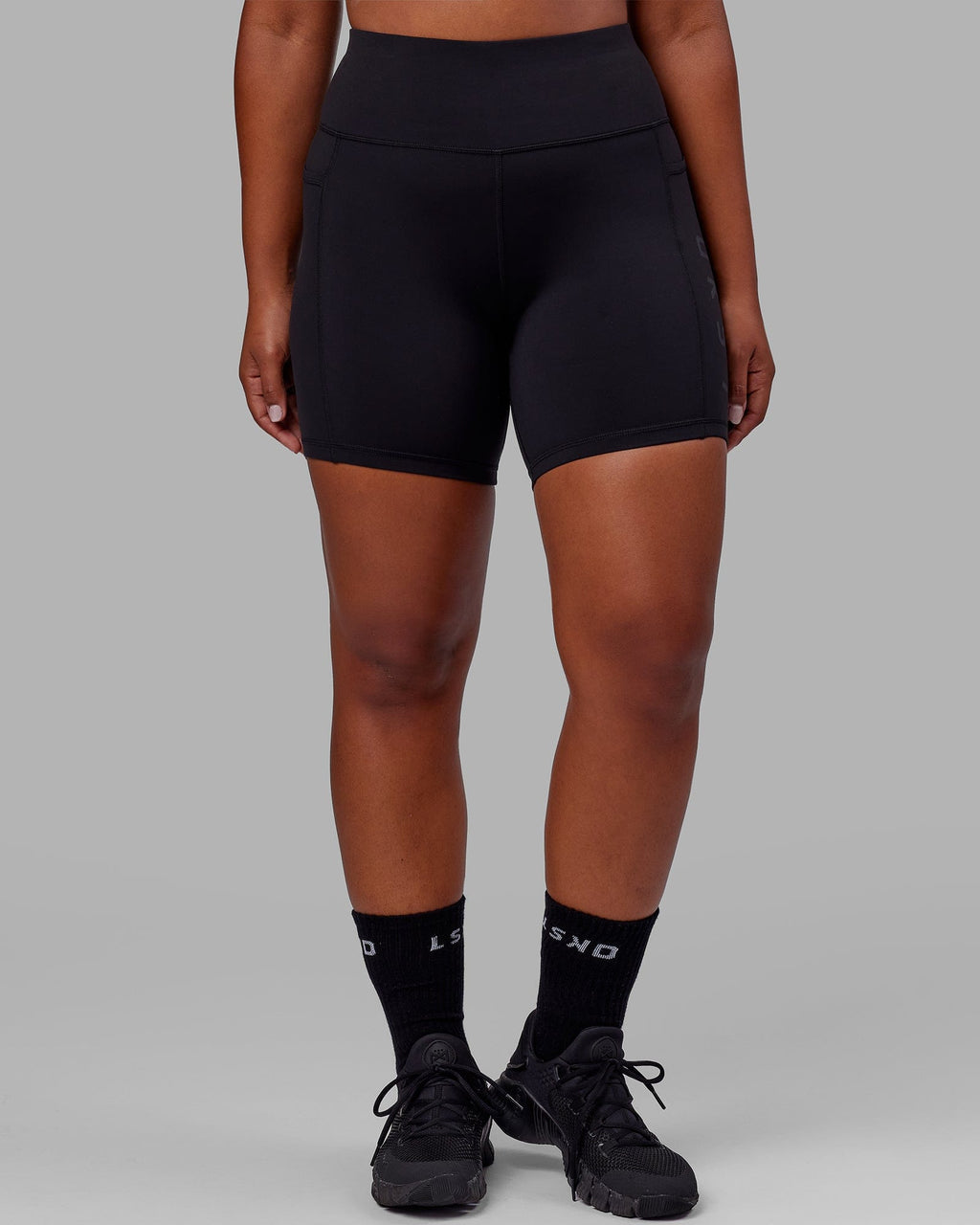 Woman wearing Rep Mid Short Tight - Black-Black