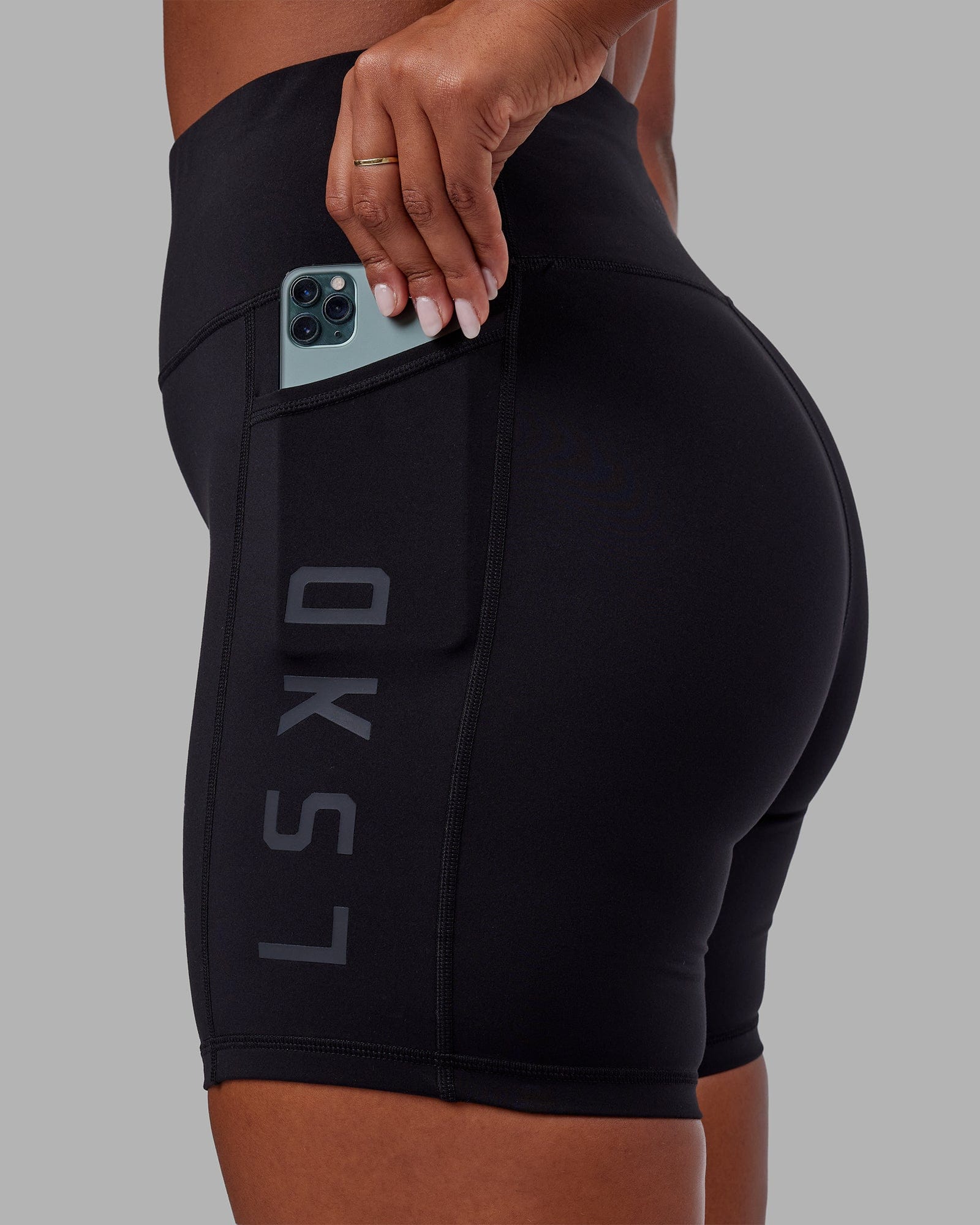 Woman wearing Rep Mid Short Tight - Black-Black