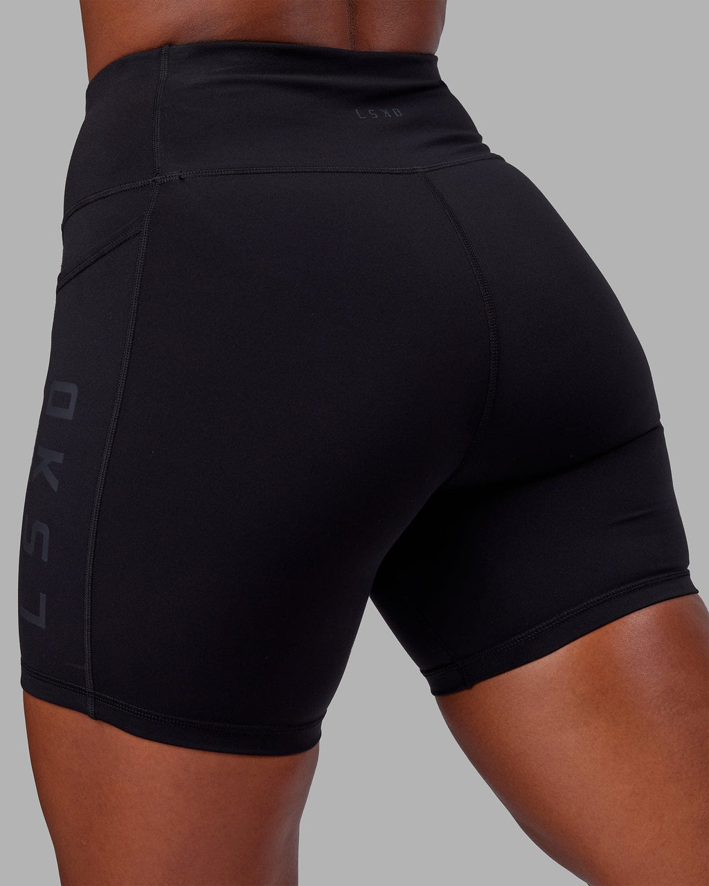 Woman wearing Rep Mid Short Tight - Black-Black