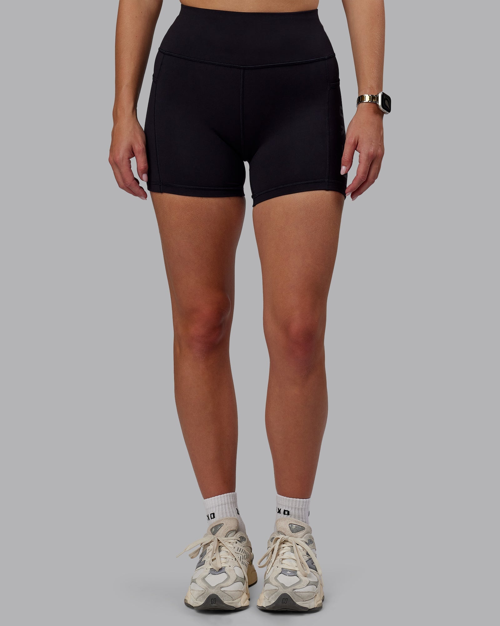 Woman wearing Rep X-Short Tight - Black-Black