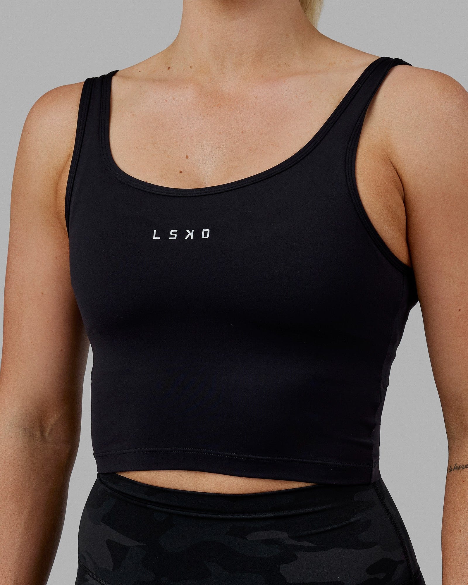 Woman wearing Staple Active Cropped Tank - Black