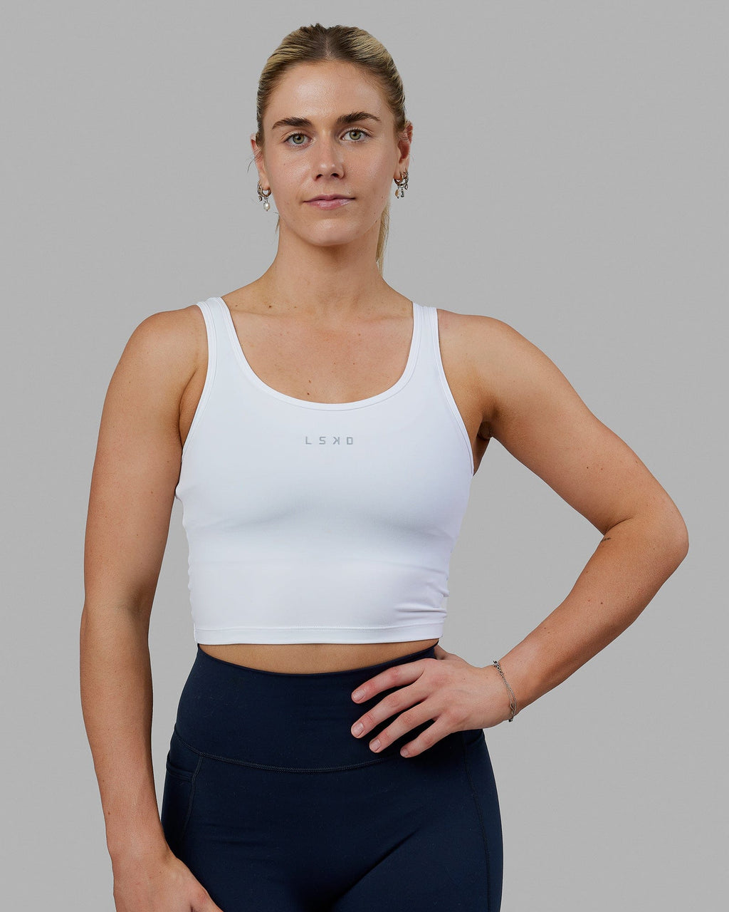 Woman wearing Staple Active Cropped Tank - White