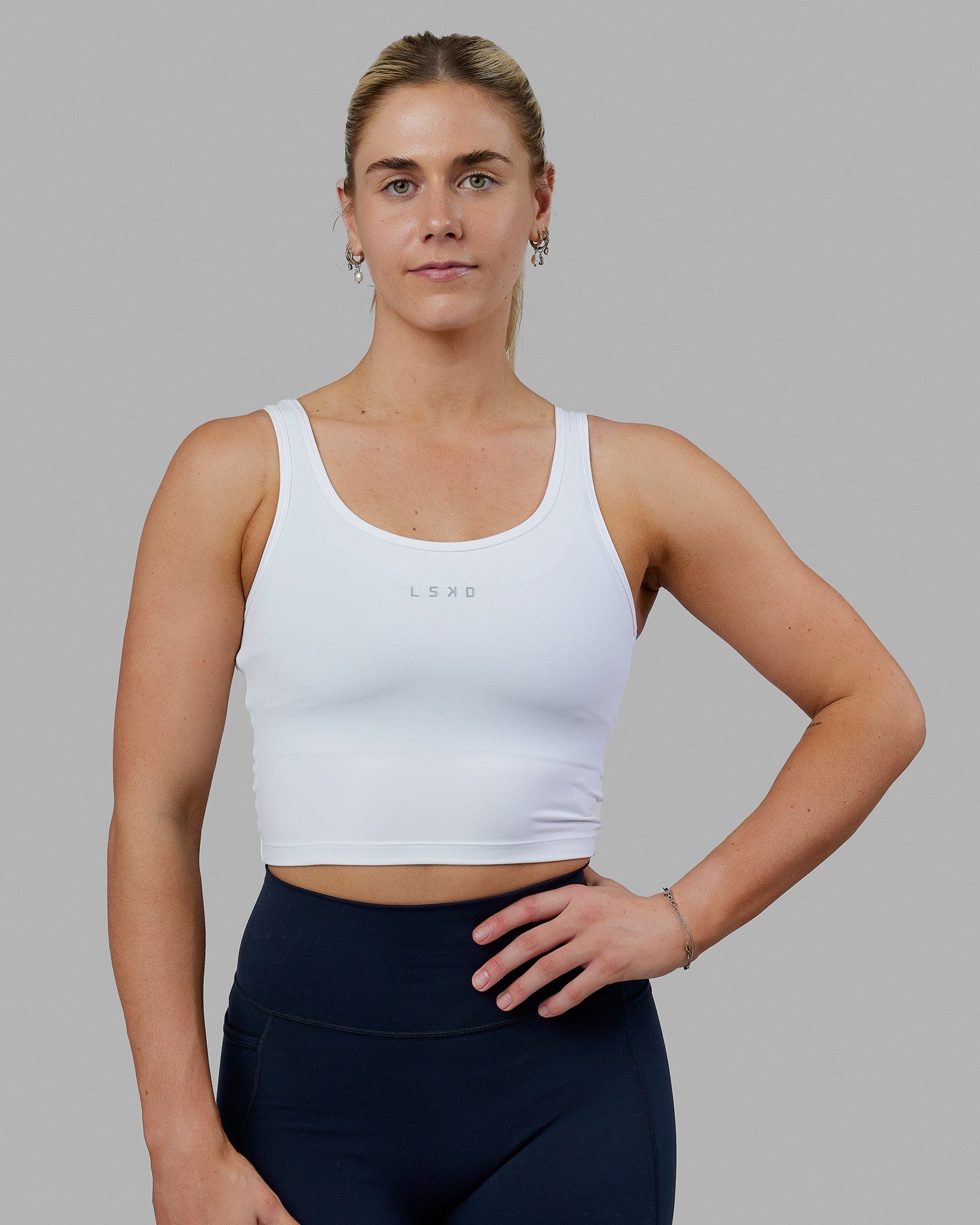 Woman wearing Staple Active Cropped Tank - White