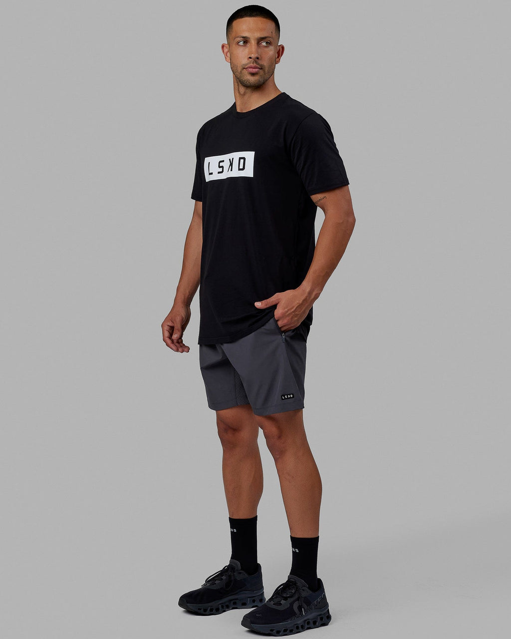 Man wearing Strength FLXCotton Tee - Black-White