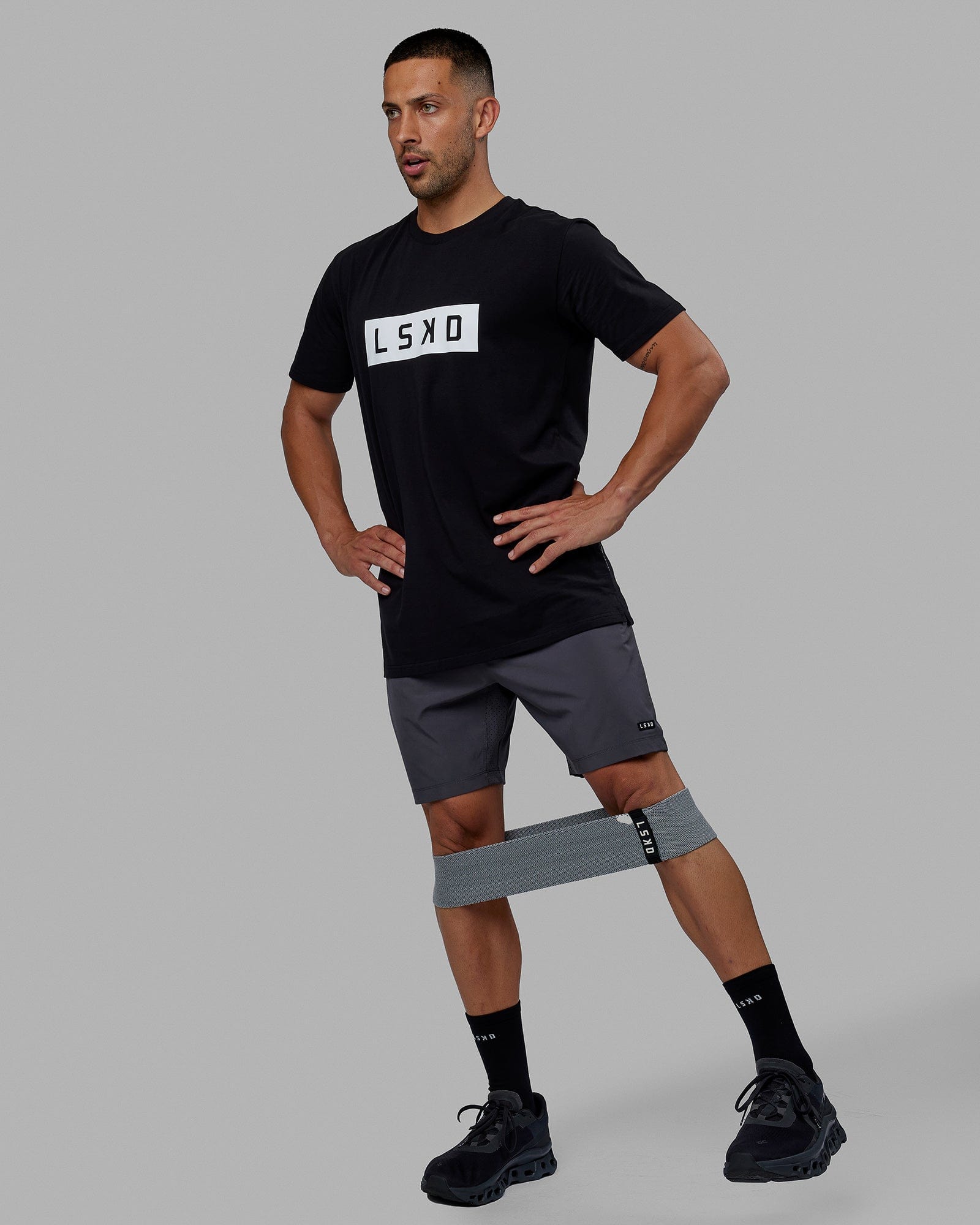 Man wearing Strength FLXCotton Tee - Black-White