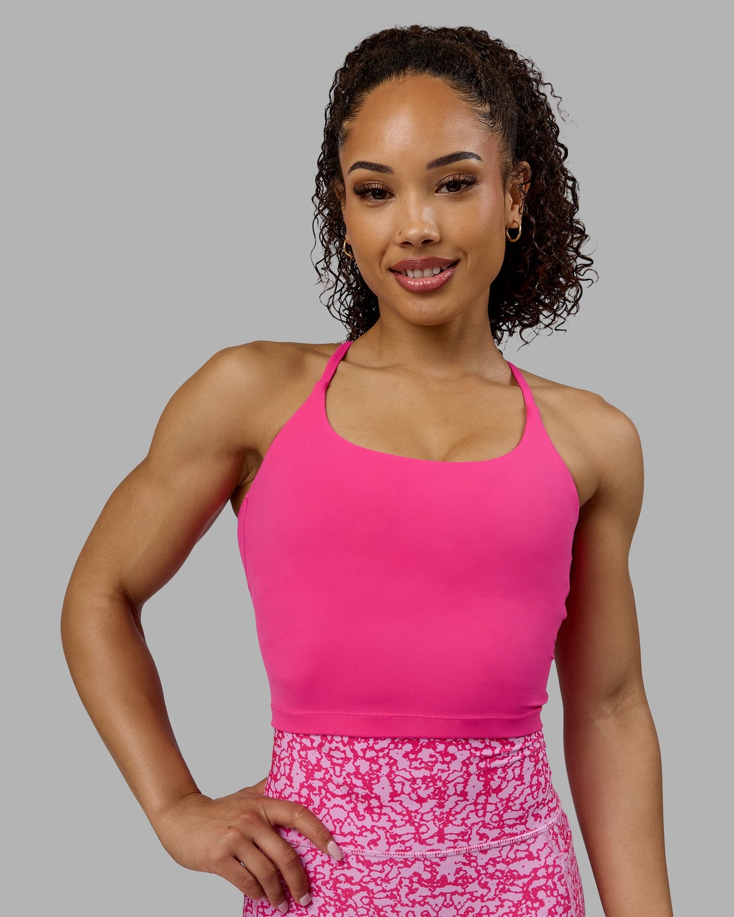 Woman wearing Twist Shelf Bra Tank - Ultra Pink