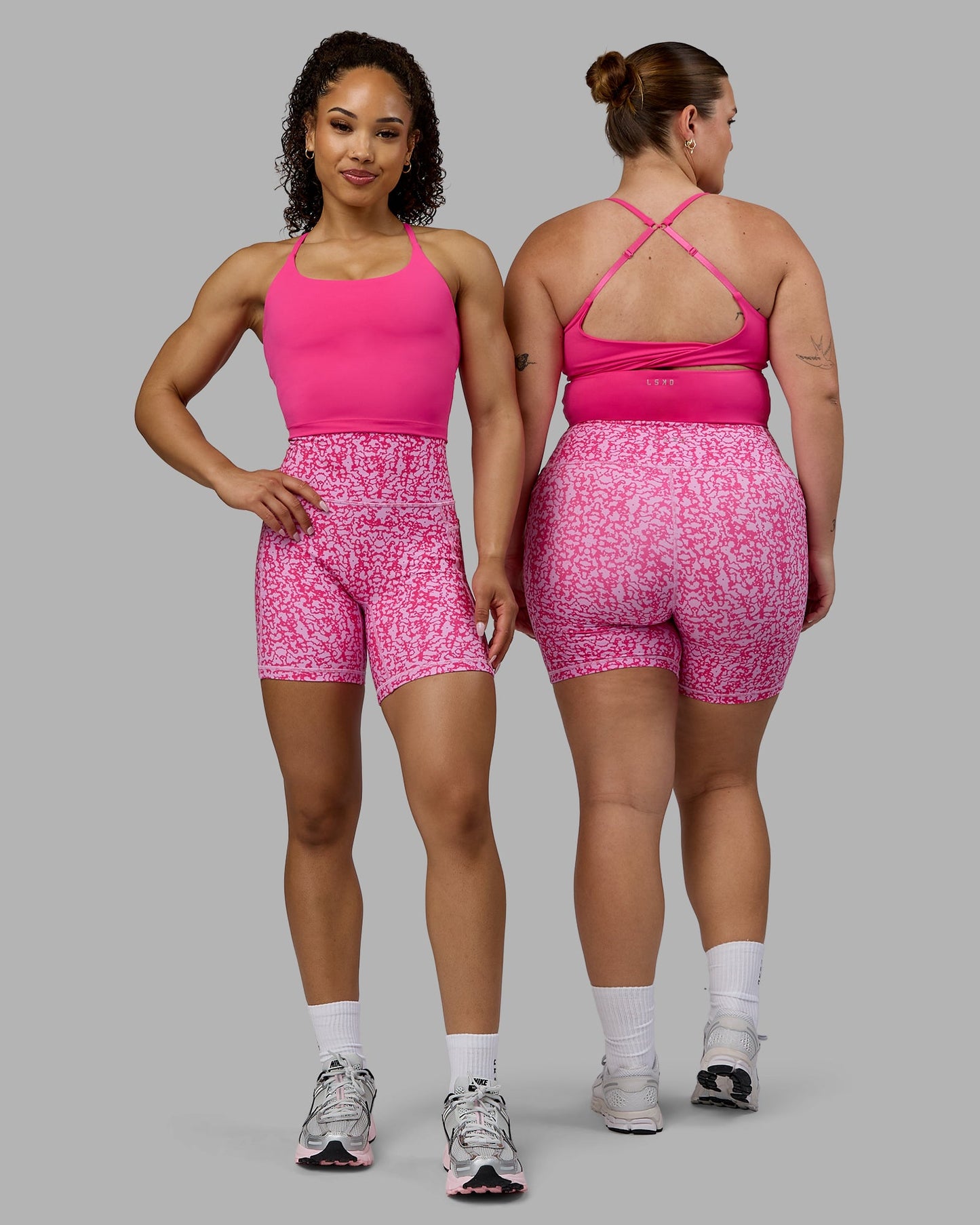 Woman wearing Twist Shelf Bra Tank - Ultra Pink