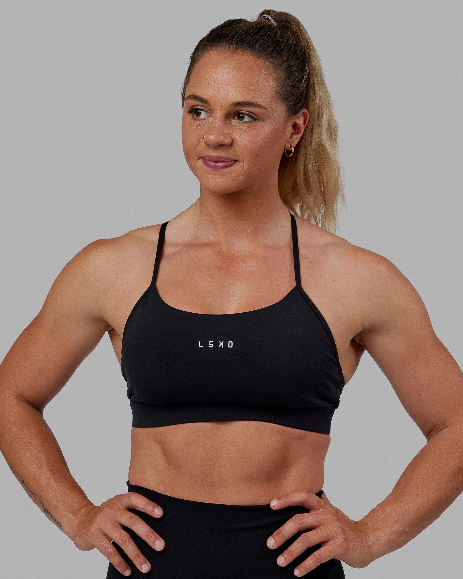 Woman wearing Lift Sports Bra - Black