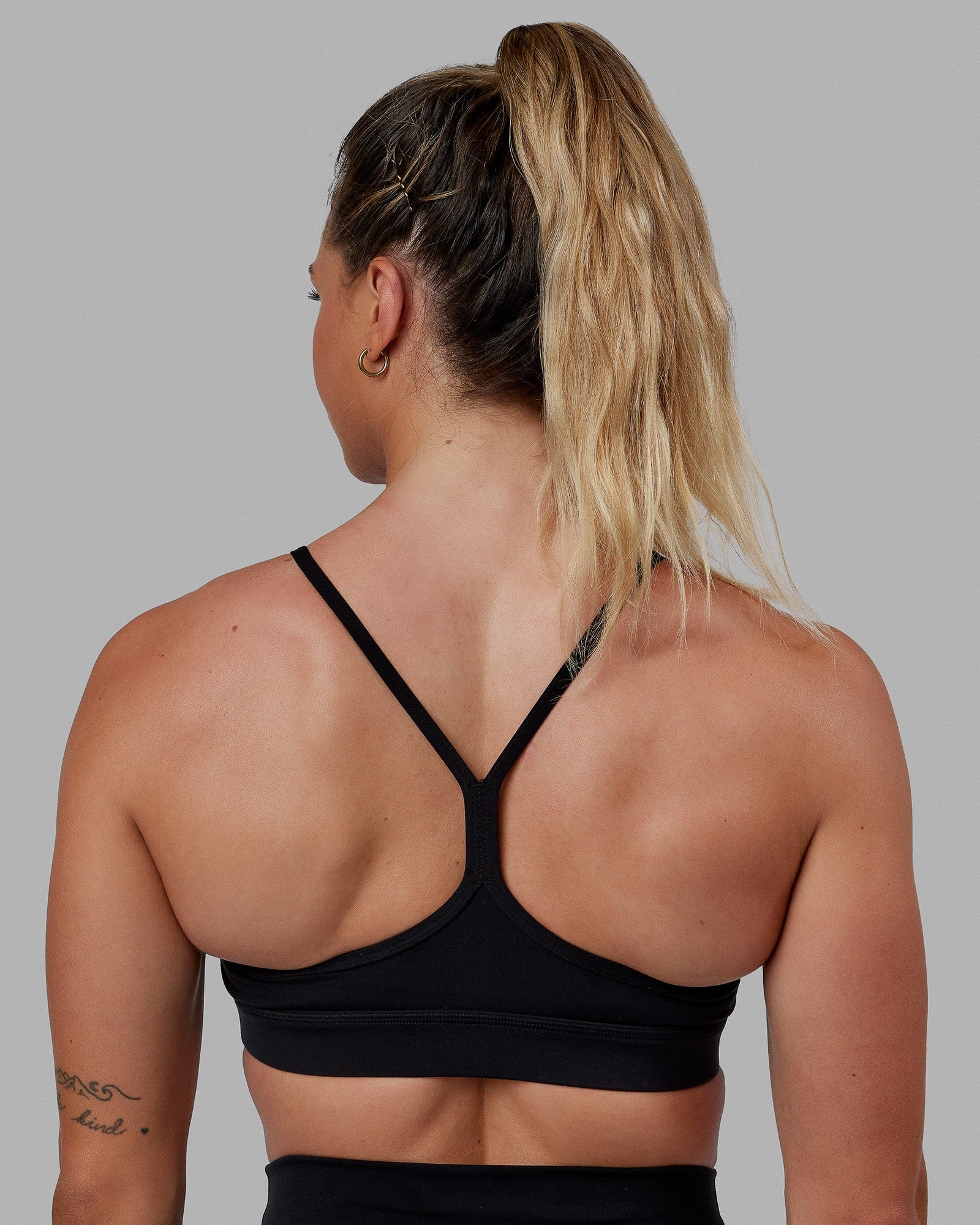 Woman wearing Lift Sports Bra - Black