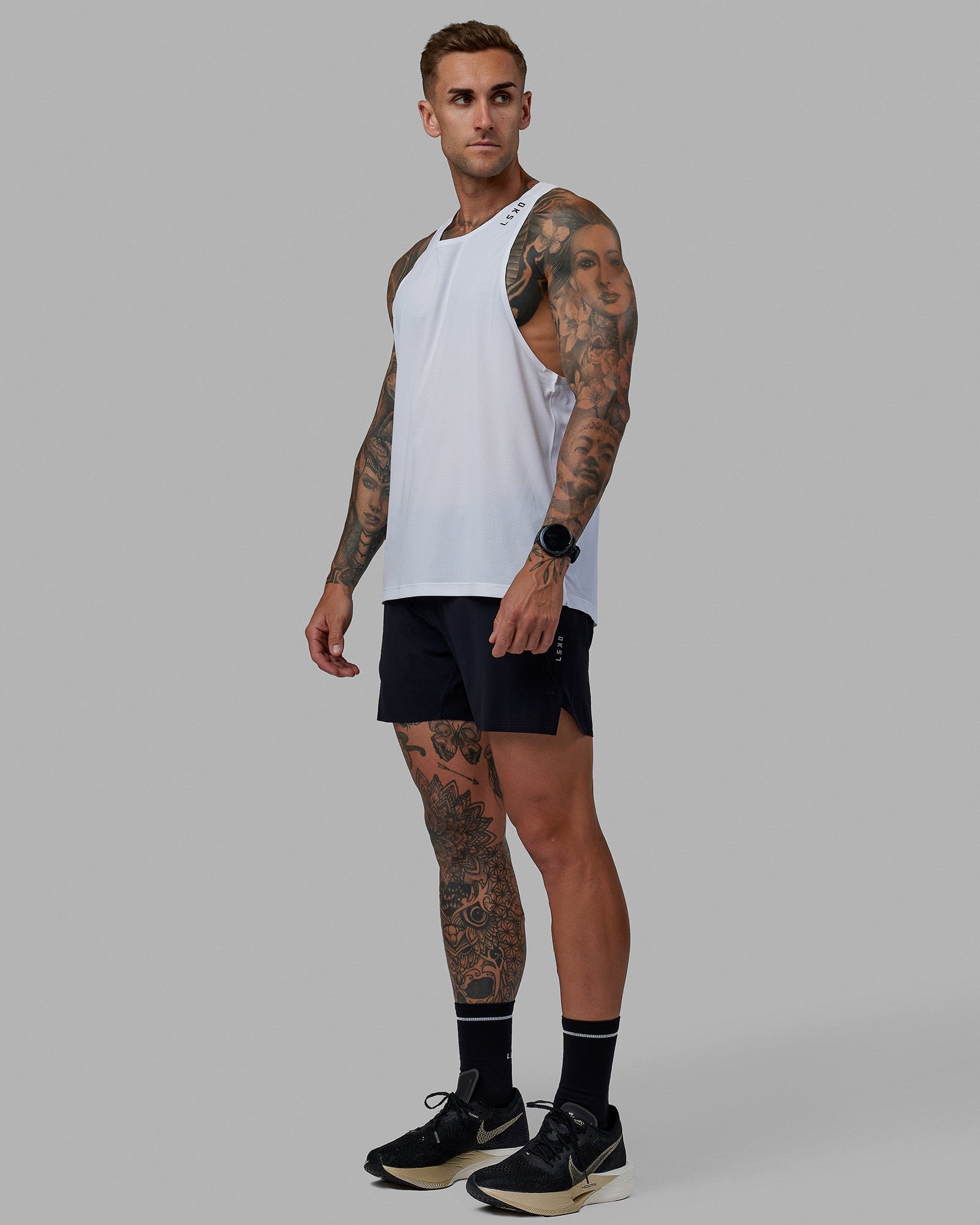 Man wearing UltraAir 5" Lined Performance Short - Black-Reflective