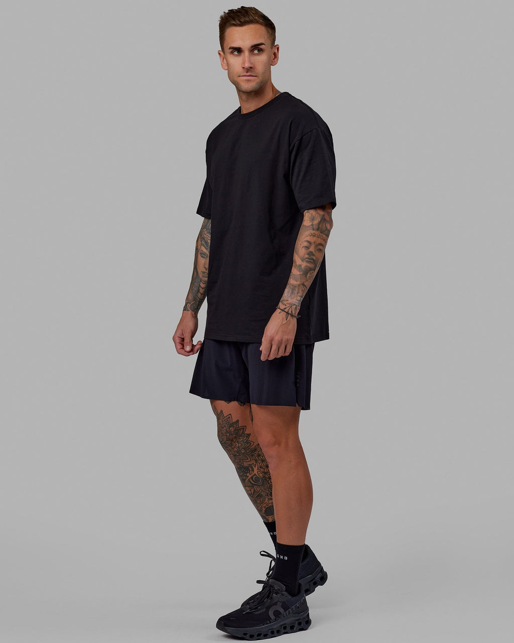 Man wearing Unisex Love The Run FLXCotton Tee Oversize - Black-White