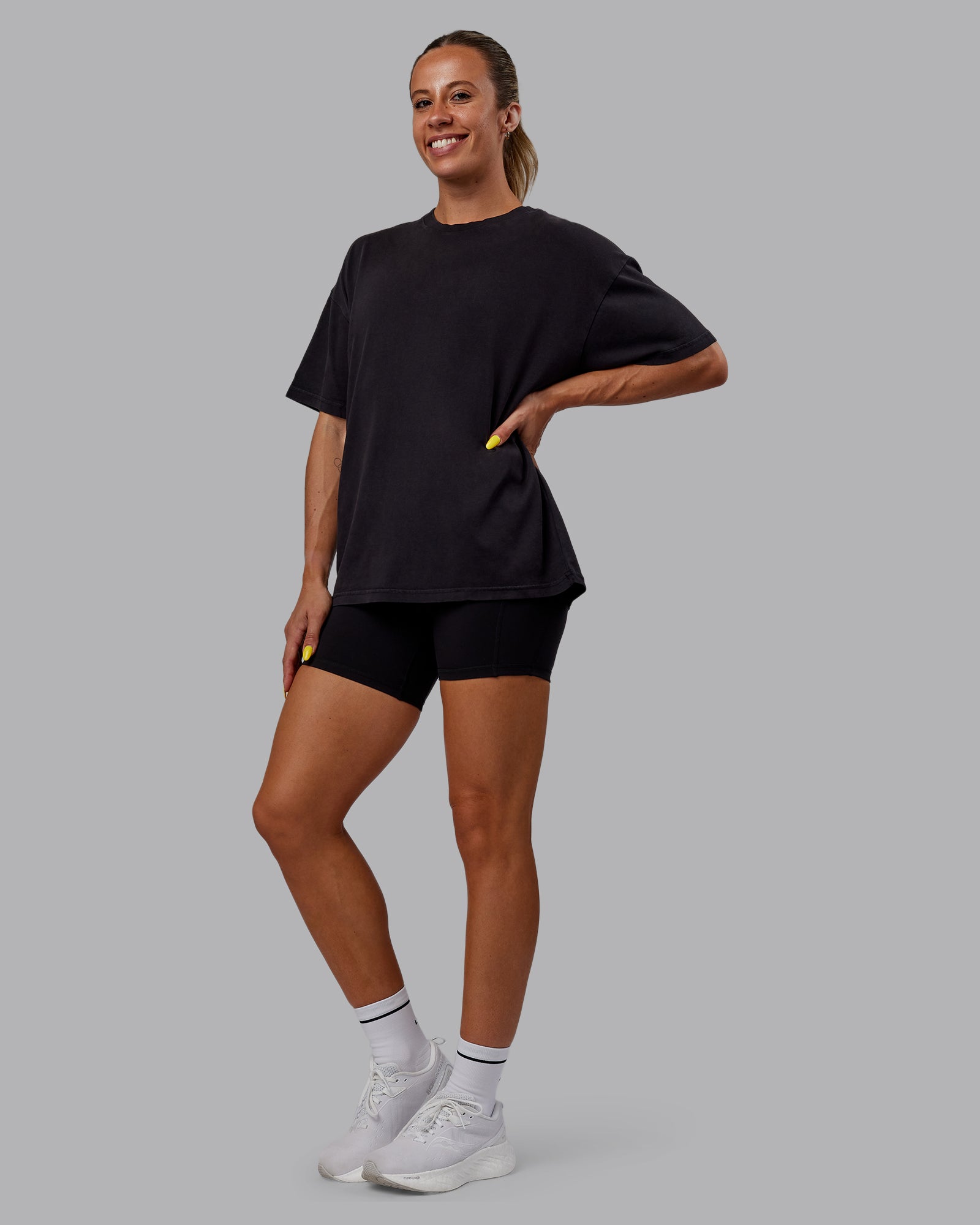 Woman wearing Unisex Washed Pressure Heavyweight Tee Oversize - Black-White