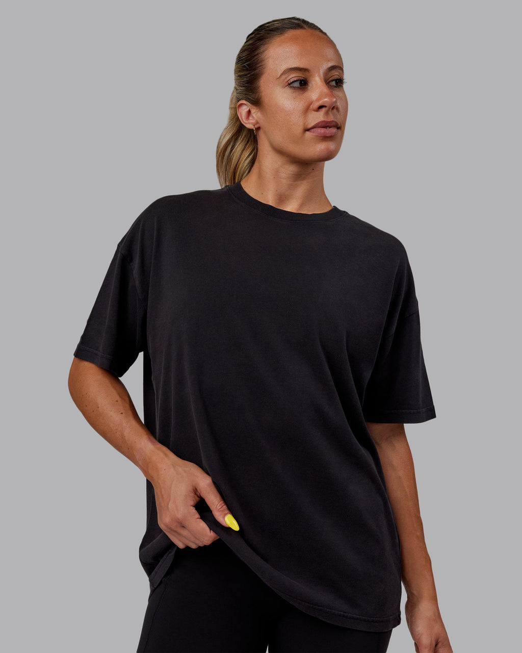 Woman wearing Unisex Washed Pressure Heavyweight Tee Oversize - Black-White
