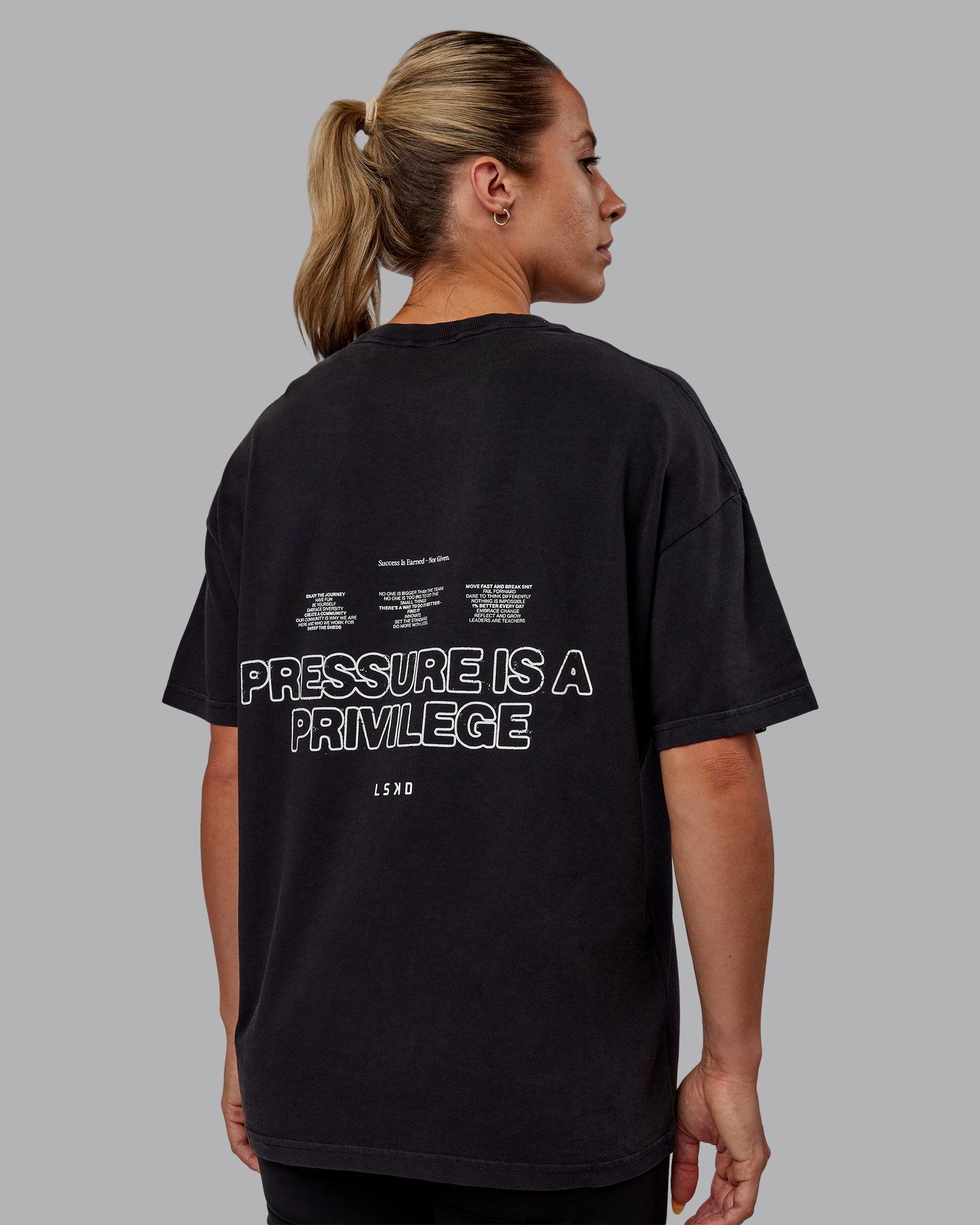 Woman wearing Unisex Washed Pressure Heavyweight Tee Oversize - Black-White