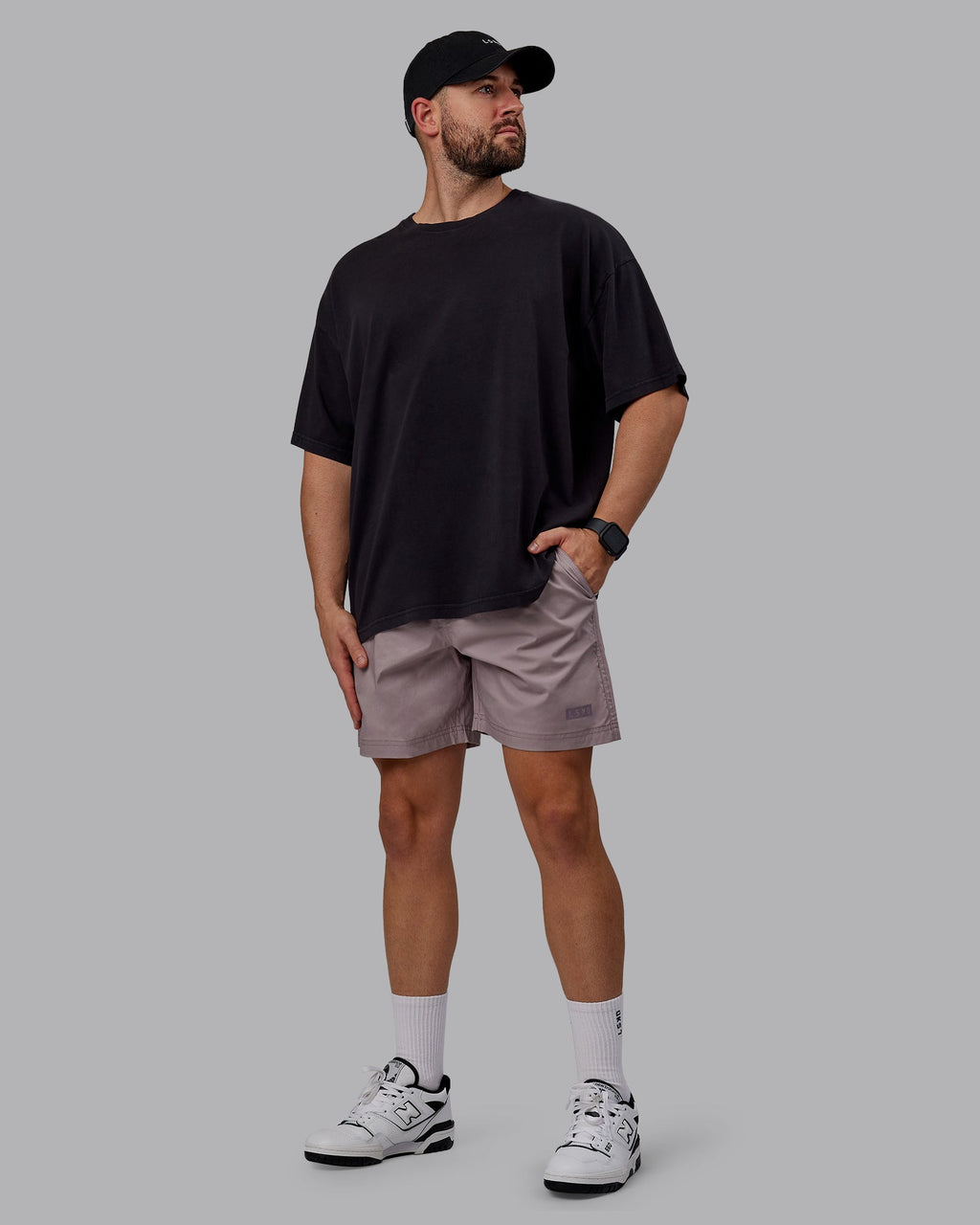 Man wearing Unisex Washed Pressure Heavyweight Tee Oversize - Black-White