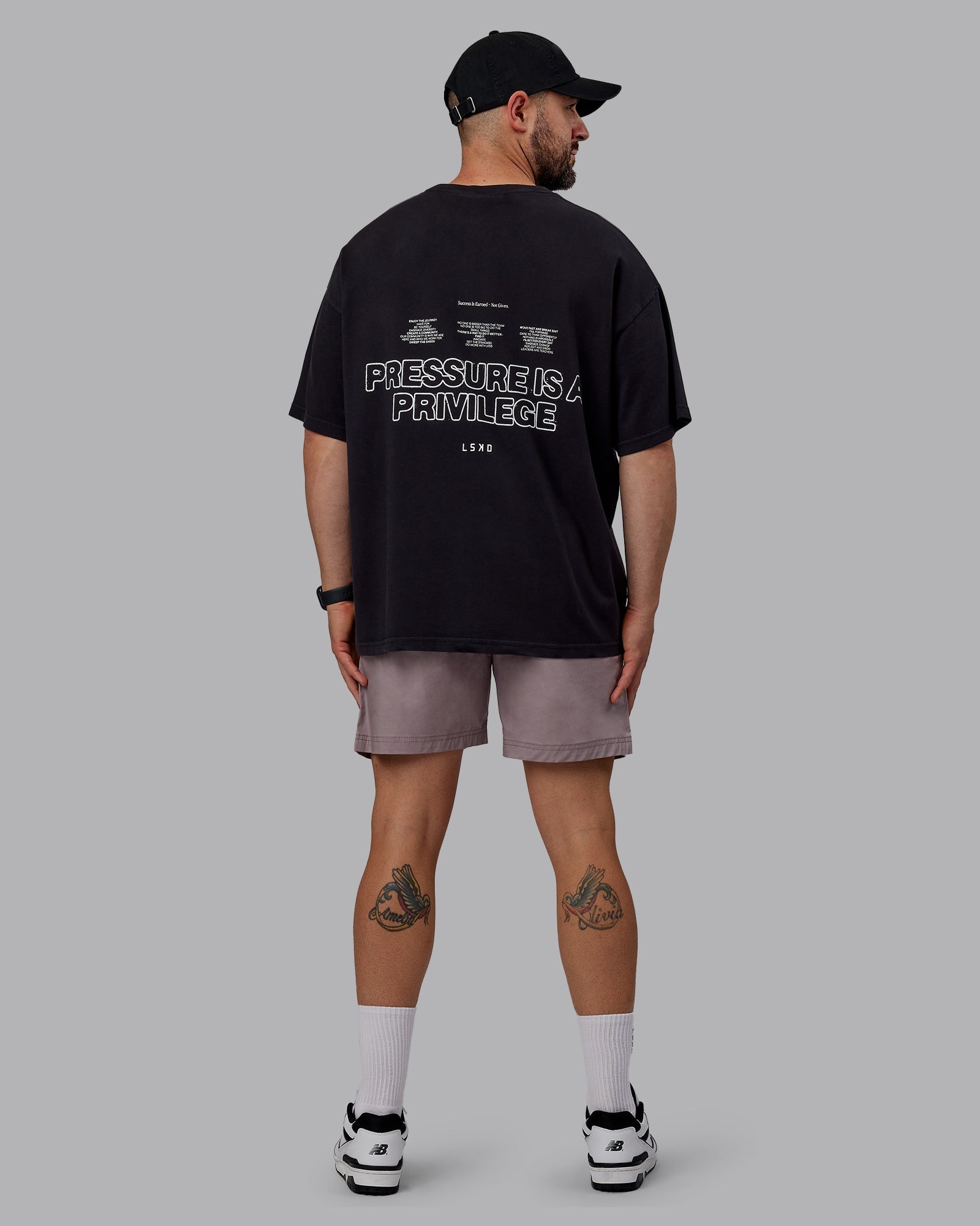 Man wearing Unisex Washed Pressure Heavyweight Tee Oversize - Black-White