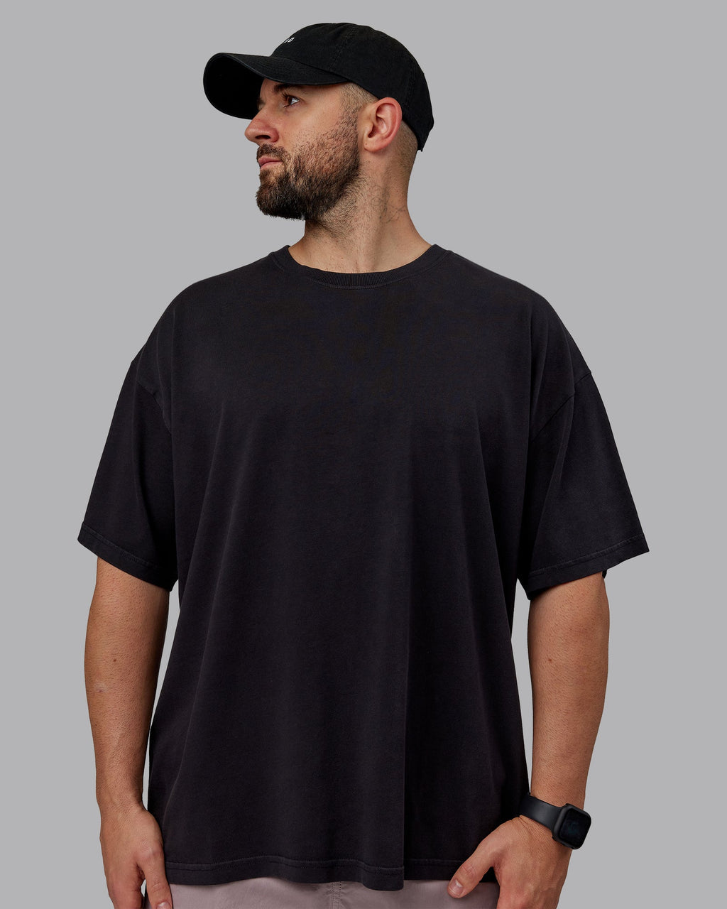 Man wearing Unisex Washed Pressure Heavyweight Tee Oversize - Black-White