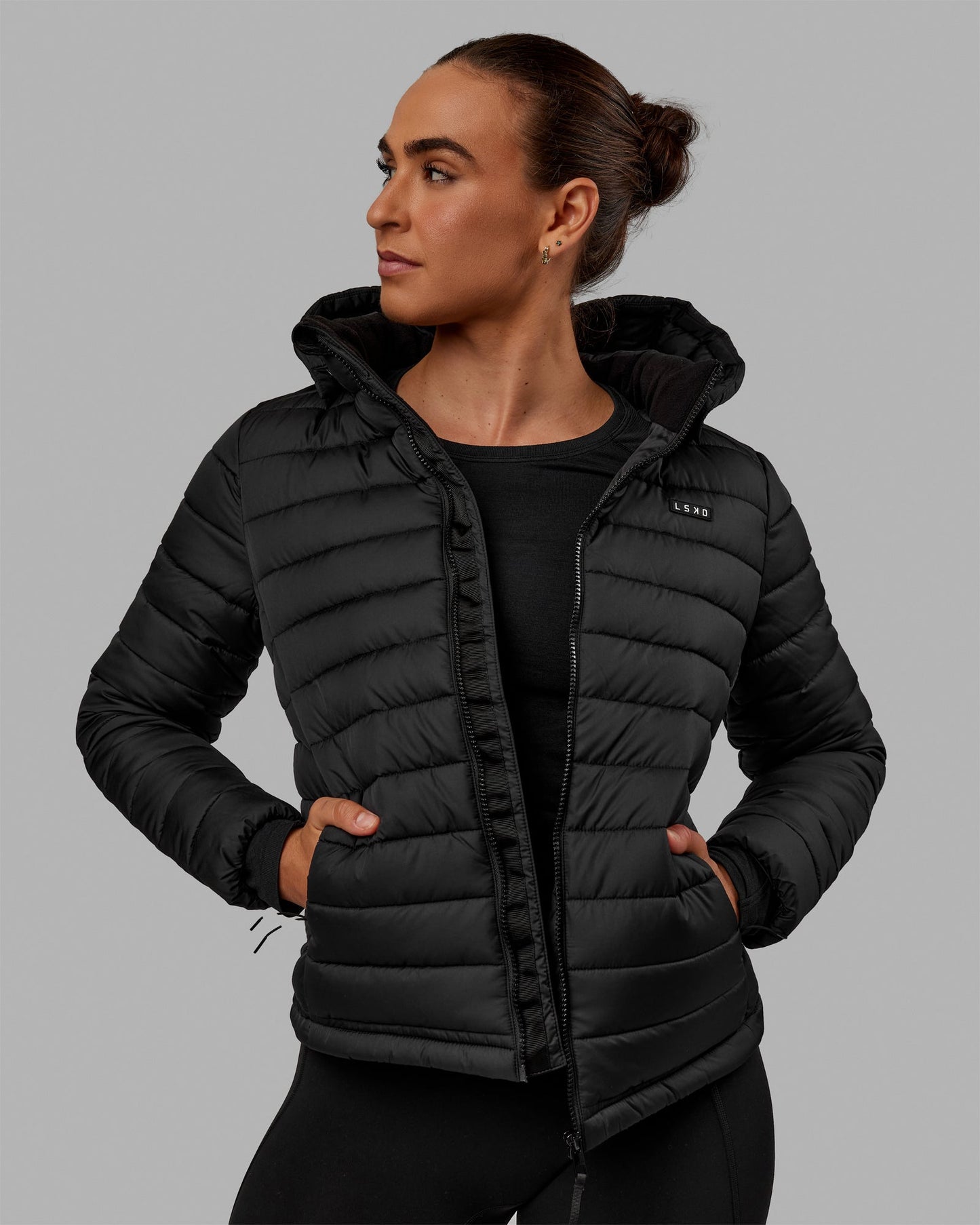 Woman wearing All-day Puffer Jacket - Black