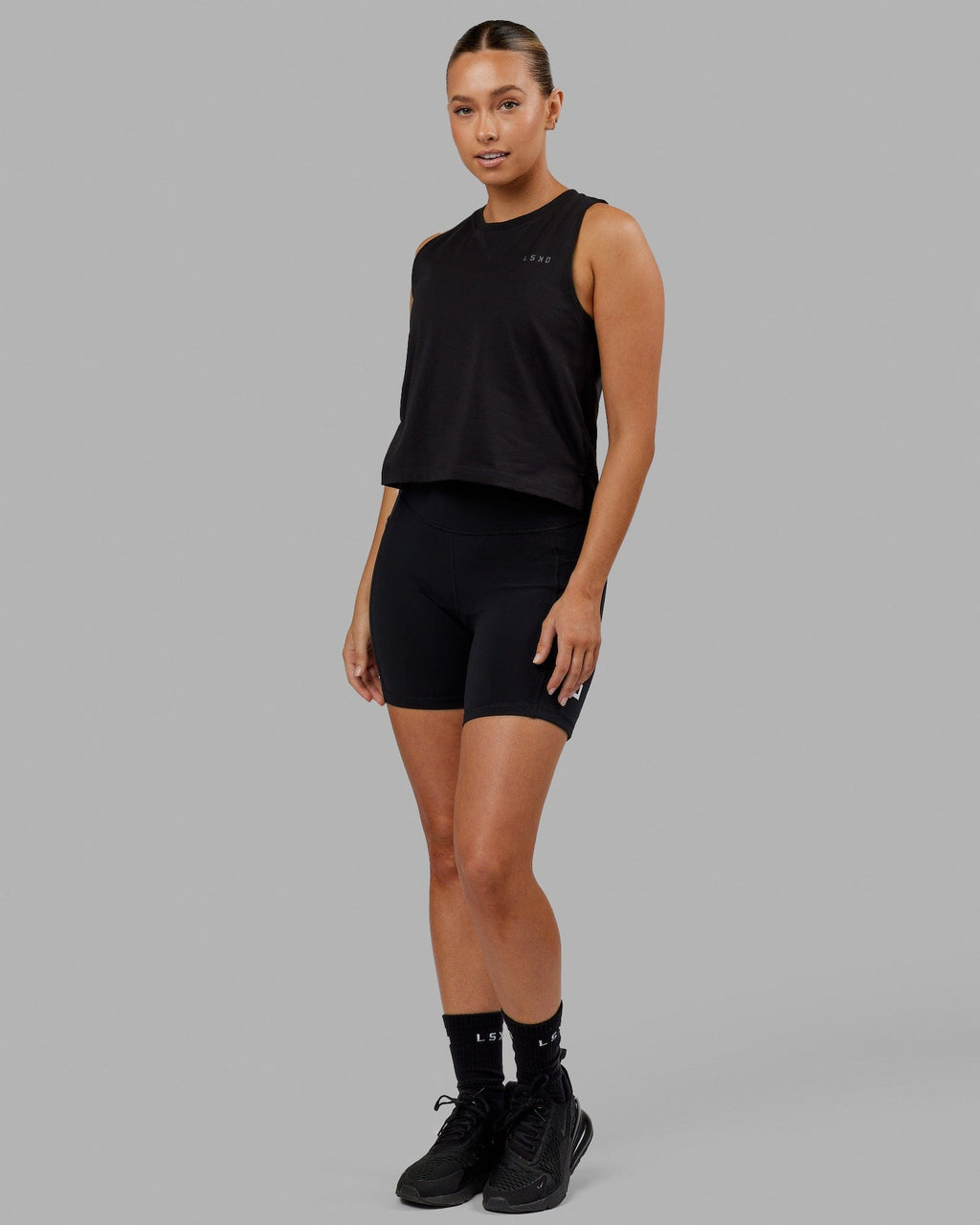 Woman wearing Deluxe PimaFLX Tank - Black