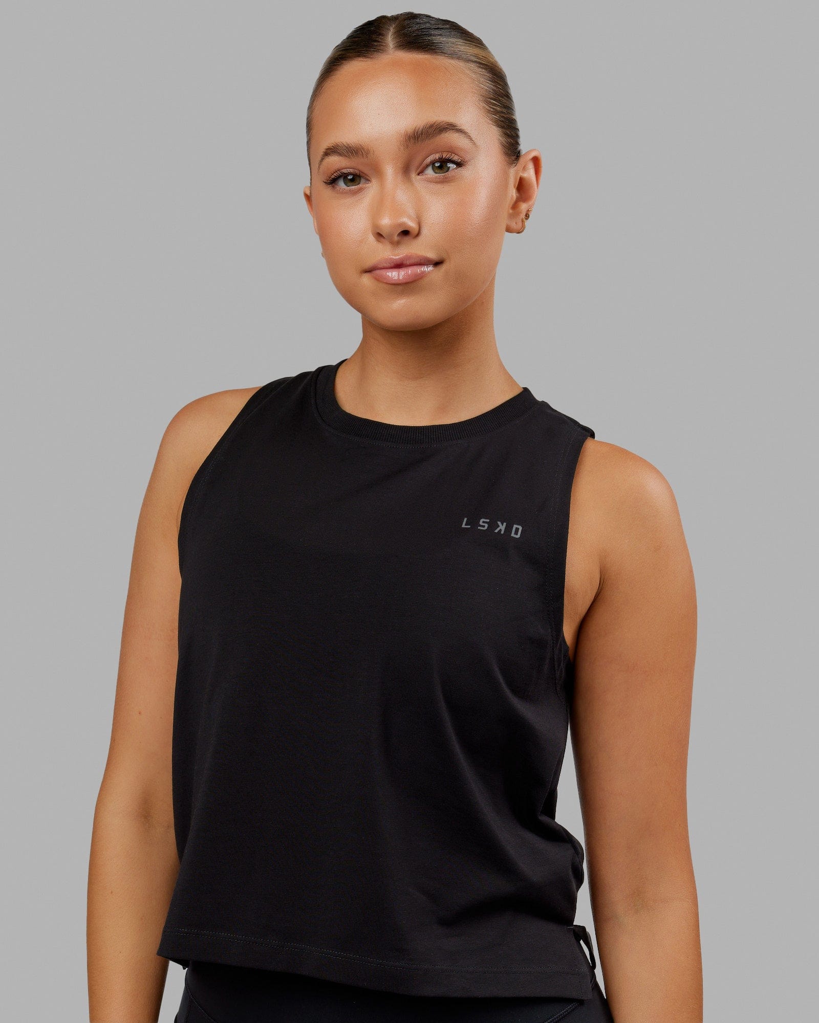 Woman wearing Deluxe PimaFLX Tank - Black