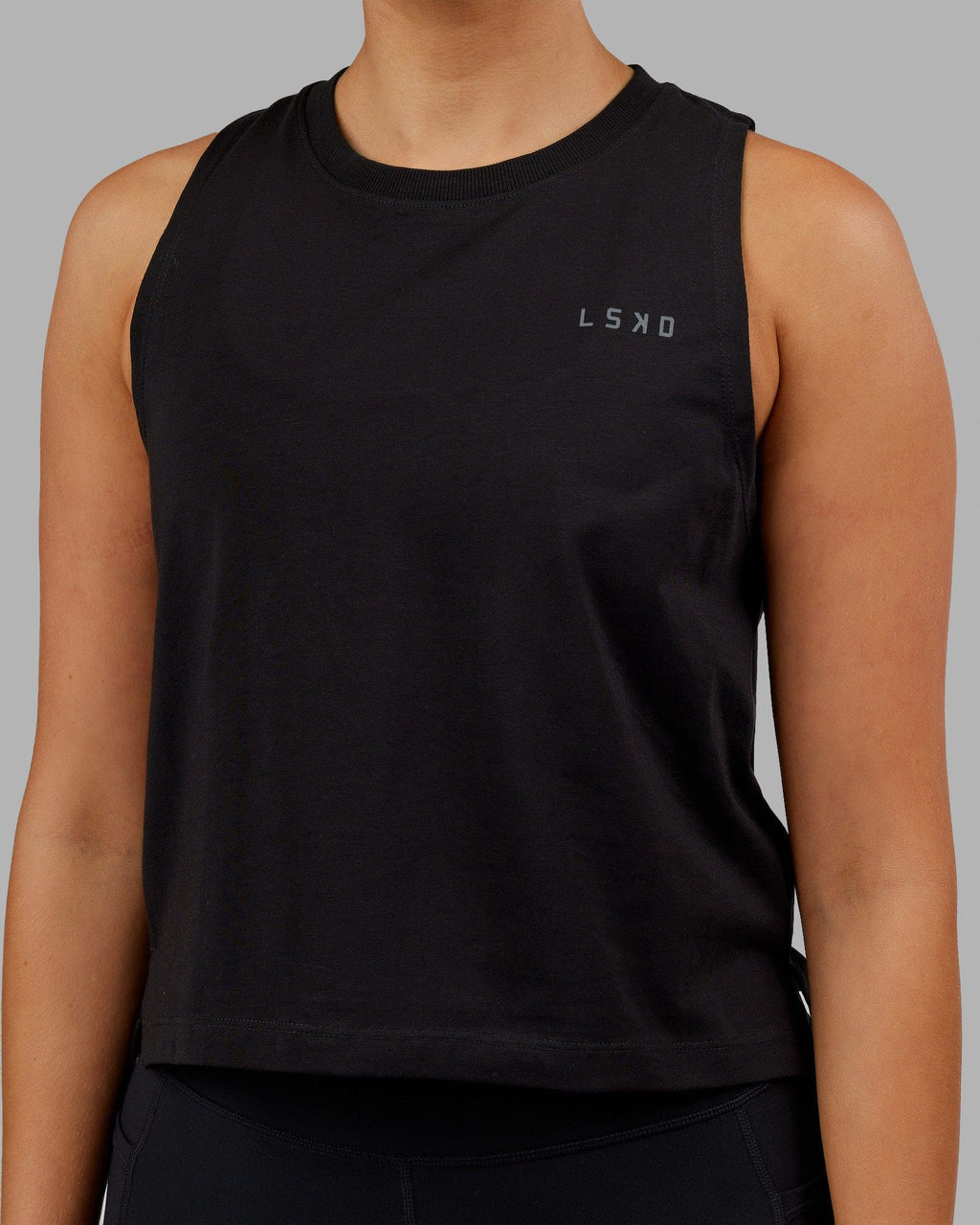 Woman wearing Deluxe PimaFLX Tank - Black