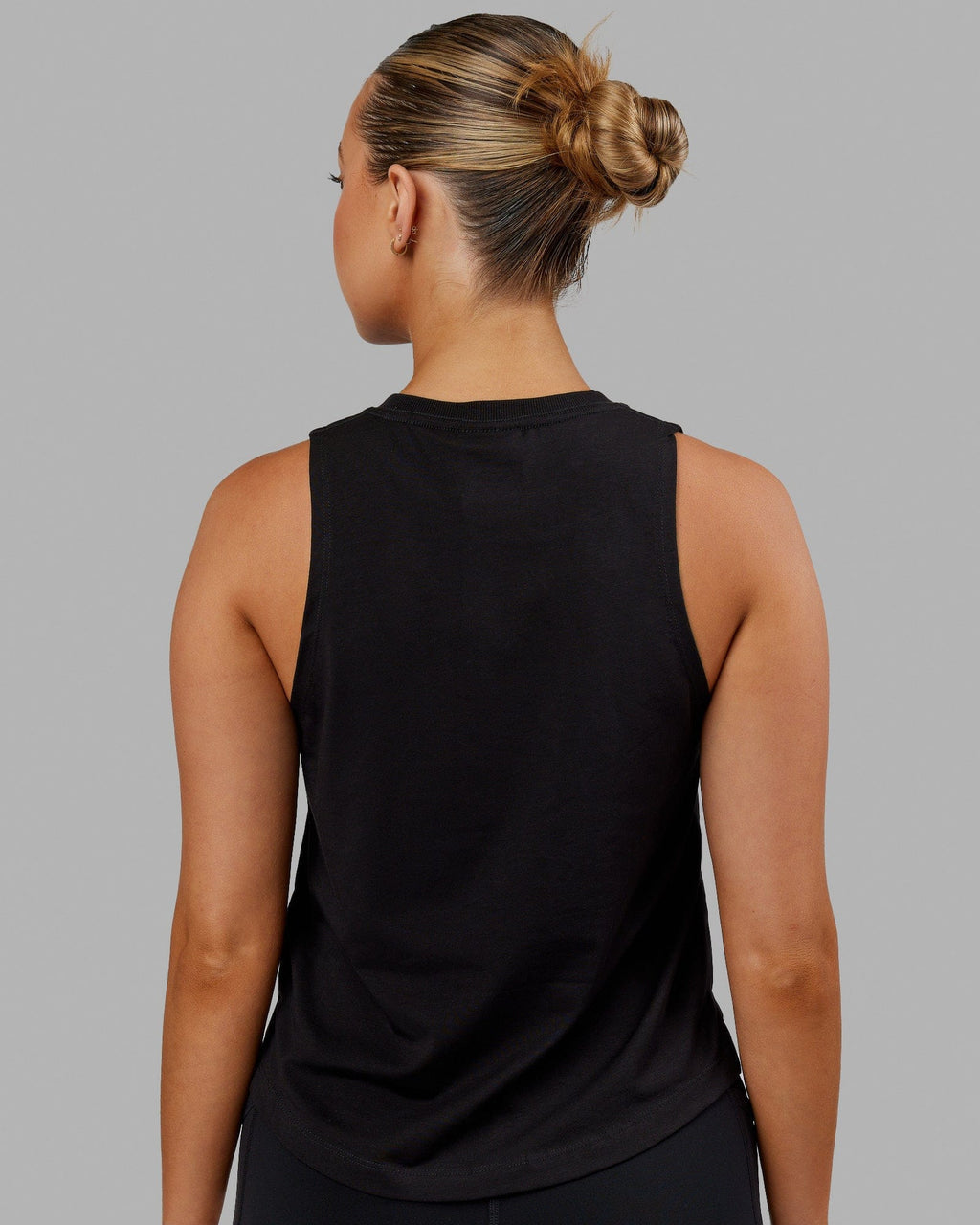 Woman wearing Deluxe PimaFLX Tank - Black