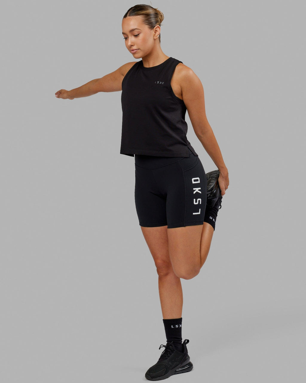 Woman wearing Deluxe PimaFLX Tank - Black