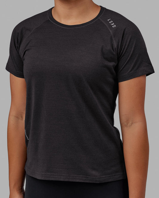 Woman wearing Perform VapourFLX Tee - Black