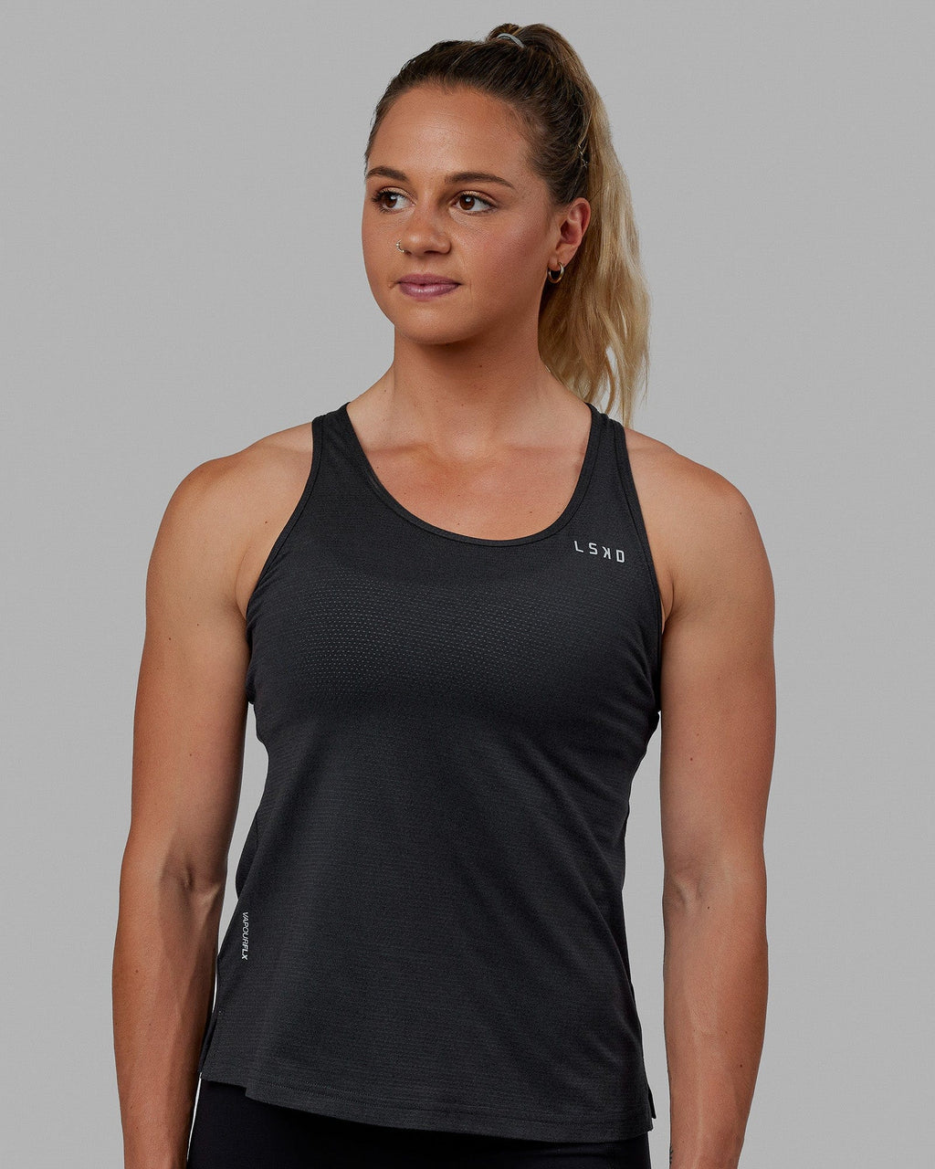 Woman wearing Perform VapourFLX Tank - Black Marl
