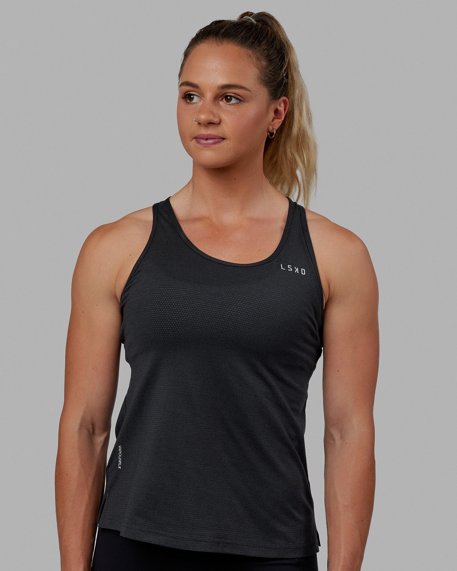 Woman wearing Perform VapourFLX Tank - Black Marl